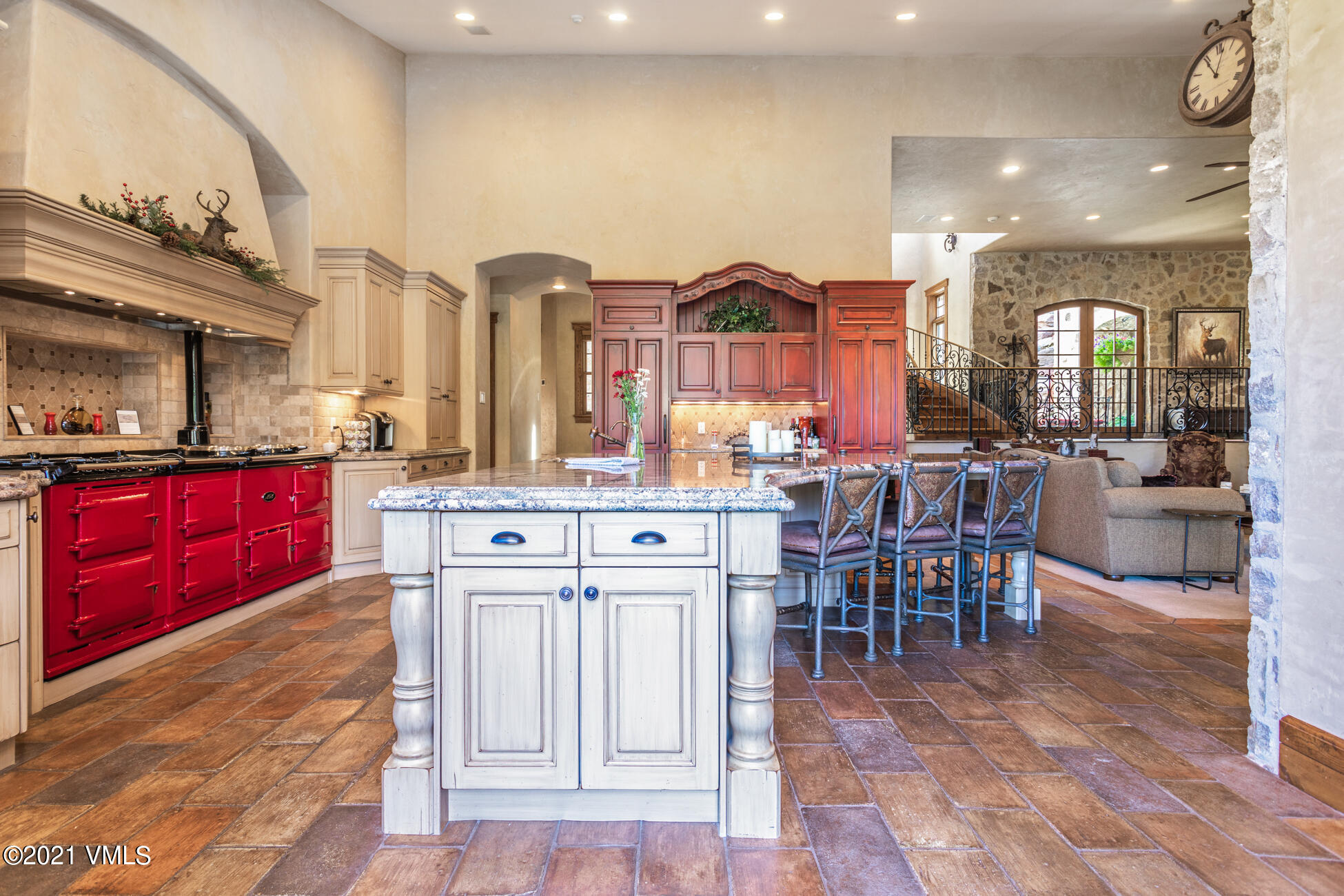 559 Eagle Drive Eagle-Vail, CO 81620 - Photo 17 of 50 a kitchen with cabinets a sink and chairs