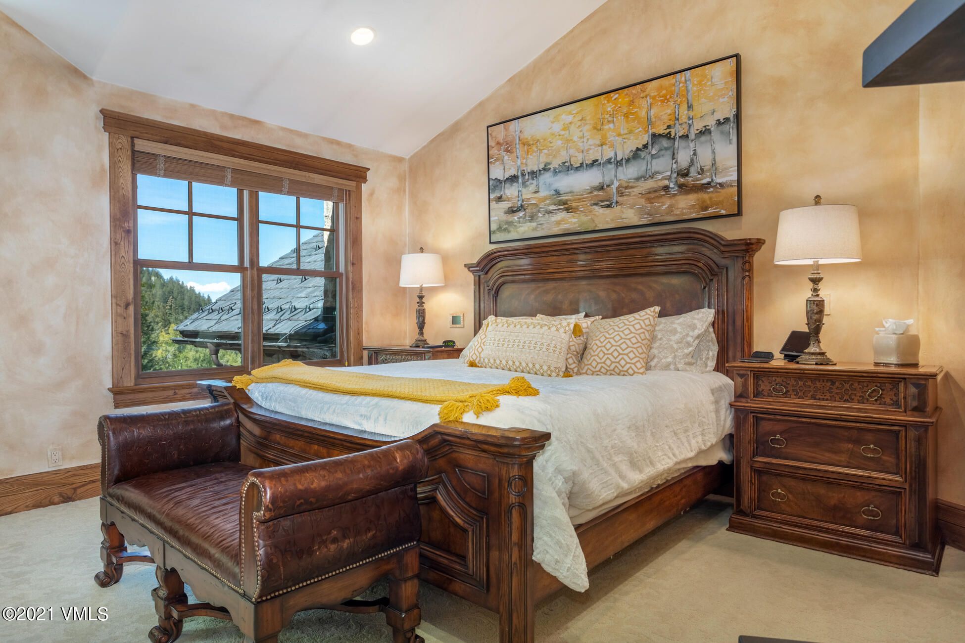 559 Eagle Drive Eagle-Vail, CO 81620 - Photo 21 of 50 a bedroom with a bed and a night stand