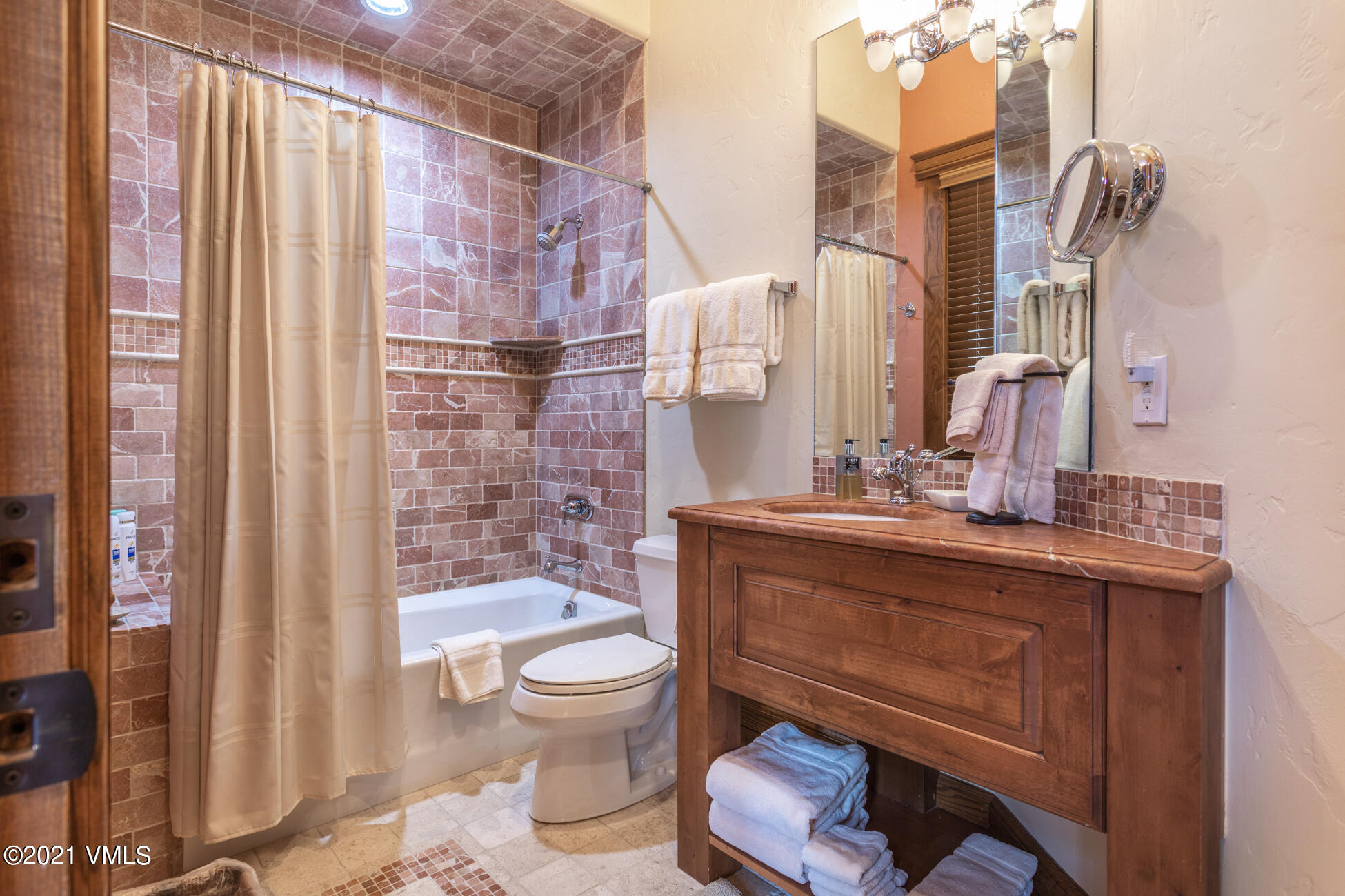 559 Eagle Drive Eagle-Vail, CO 81620 - Photo 34 of 50 a bathroom with a sink toilet and shower