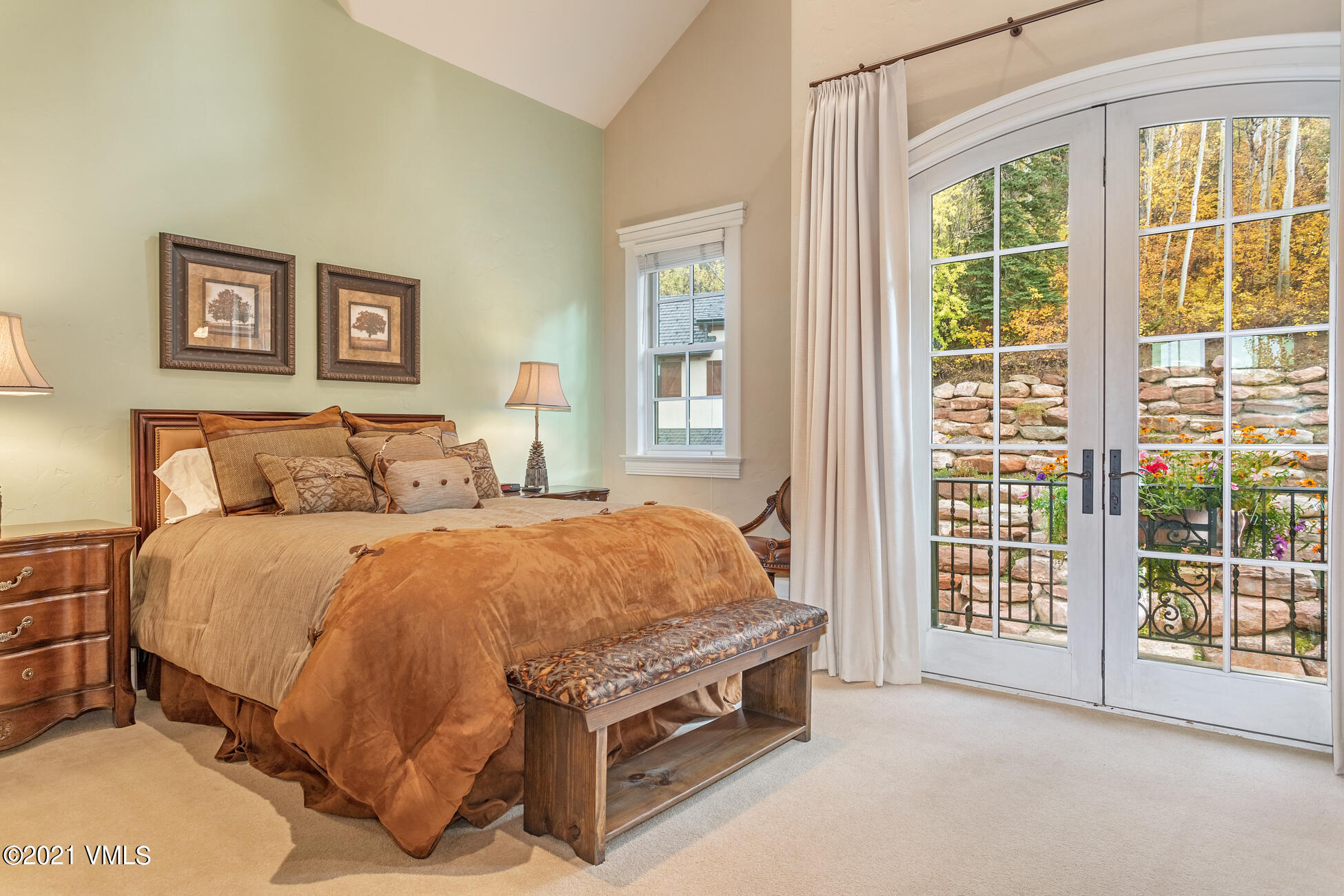 559 Eagle Drive Eagle-Vail, CO 81620 - Photo 35 of 50 a bed sitting in a bedroom next to a window