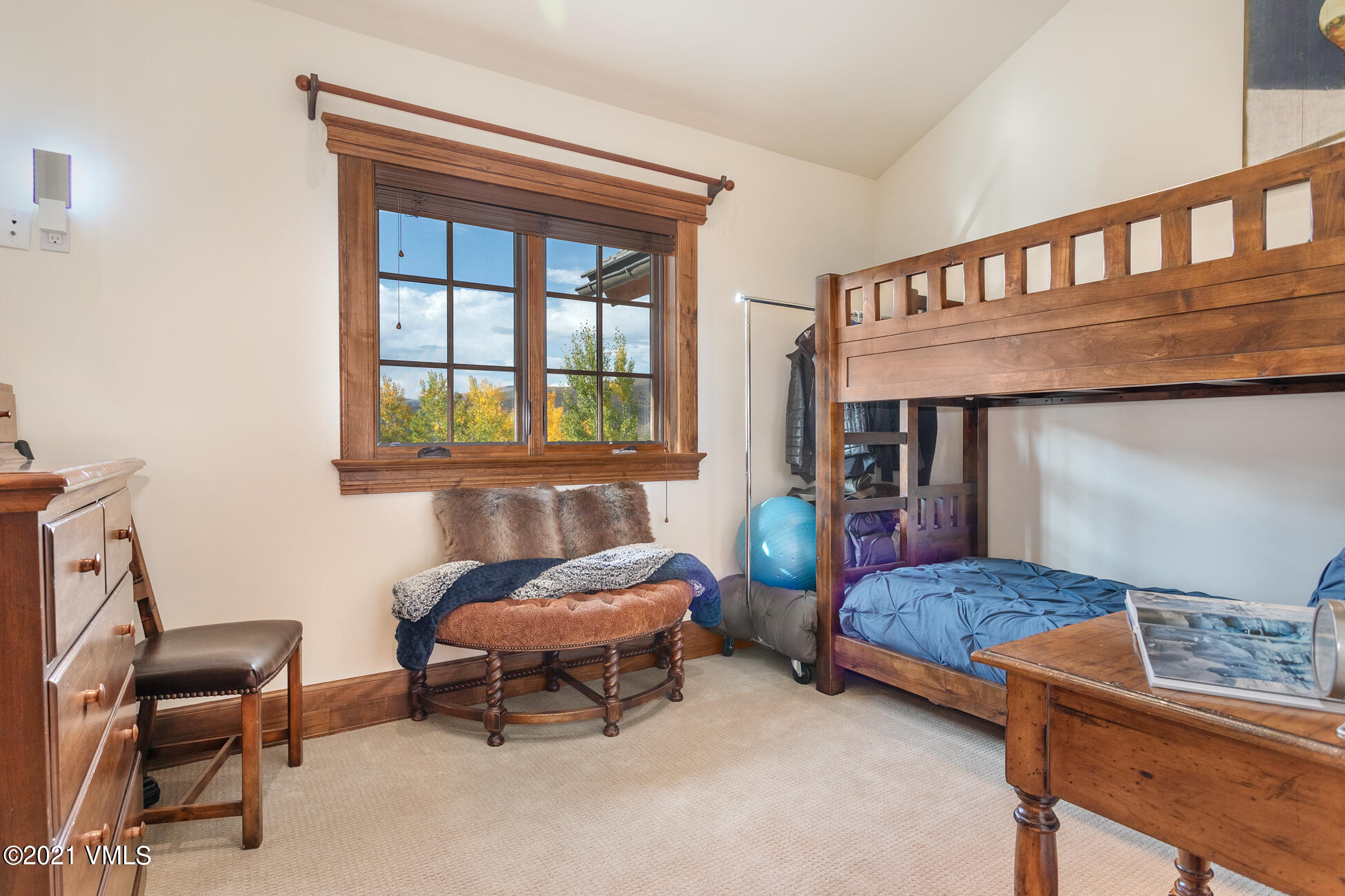 559 Eagle Drive Eagle-Vail, CO 81620 - Photo 48 of 50 a bedroom with a bed and a window