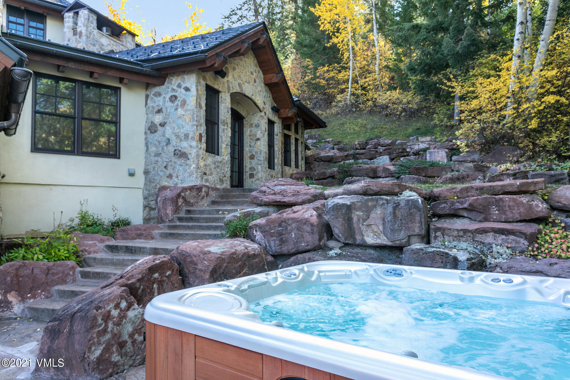559 Eagle Drive Eagle-Vail, CO 81620 - Photo 7 of 50 a front view of a house with garden
