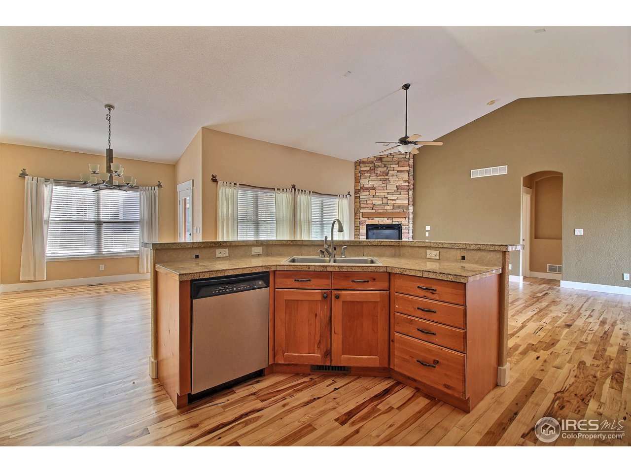 7700 Poudre River Road Greeley, CO 80634 - Photo 10 of 40 Kitchen Island/Breakfast Bar