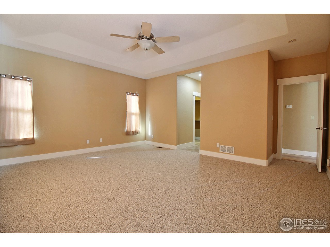 7700 Poudre River Road Greeley, CO 80634 - Photo 19 of 40 Secluded Master Bedroom