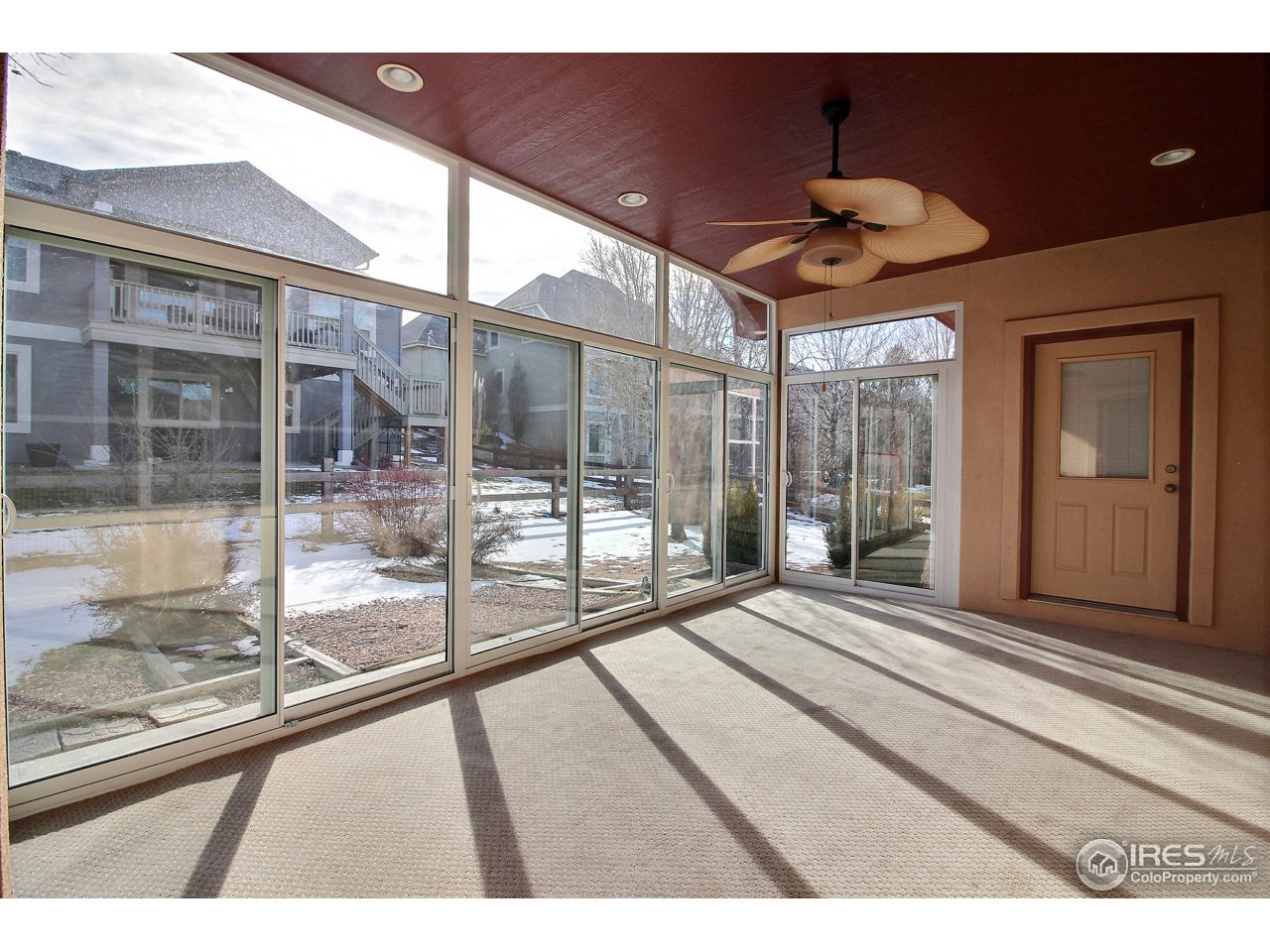 7700 Poudre River Road Greeley, CO 80634 - Photo 33 of 40 Nice Enclosed Sunroom