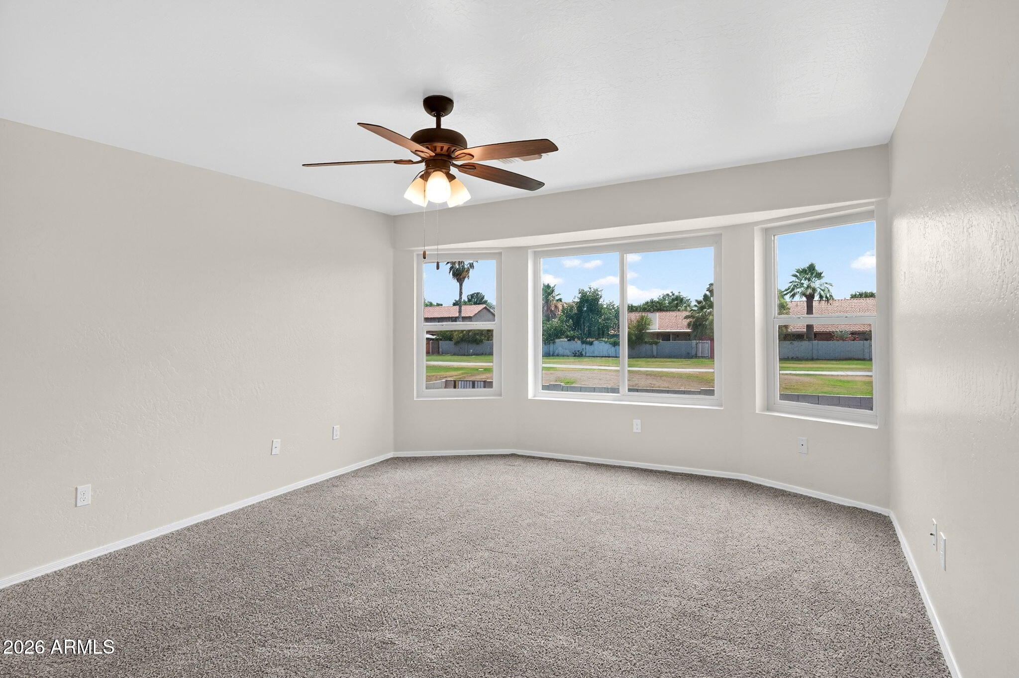 1417 East Mineral Road Gilbert, AZ 85234 - Photo 5 of 59 a view of room window and a ceiling fan