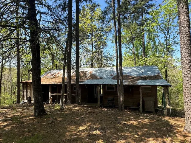 a view of a couches under an umbrella