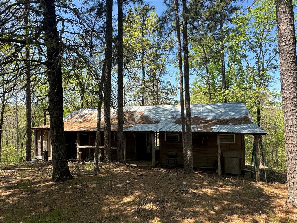 0 Tucker Road Fort Towson, OK 74735 - Photo 3 of 32 a view of a couches under an umbrella