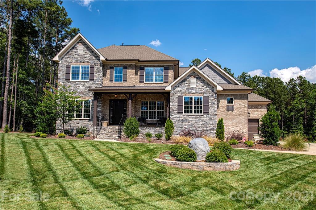 1286 Trinity Ridge Parkway Fort Mill, SC 29715 - Photo 1 of 48 a front view of a house with a yard