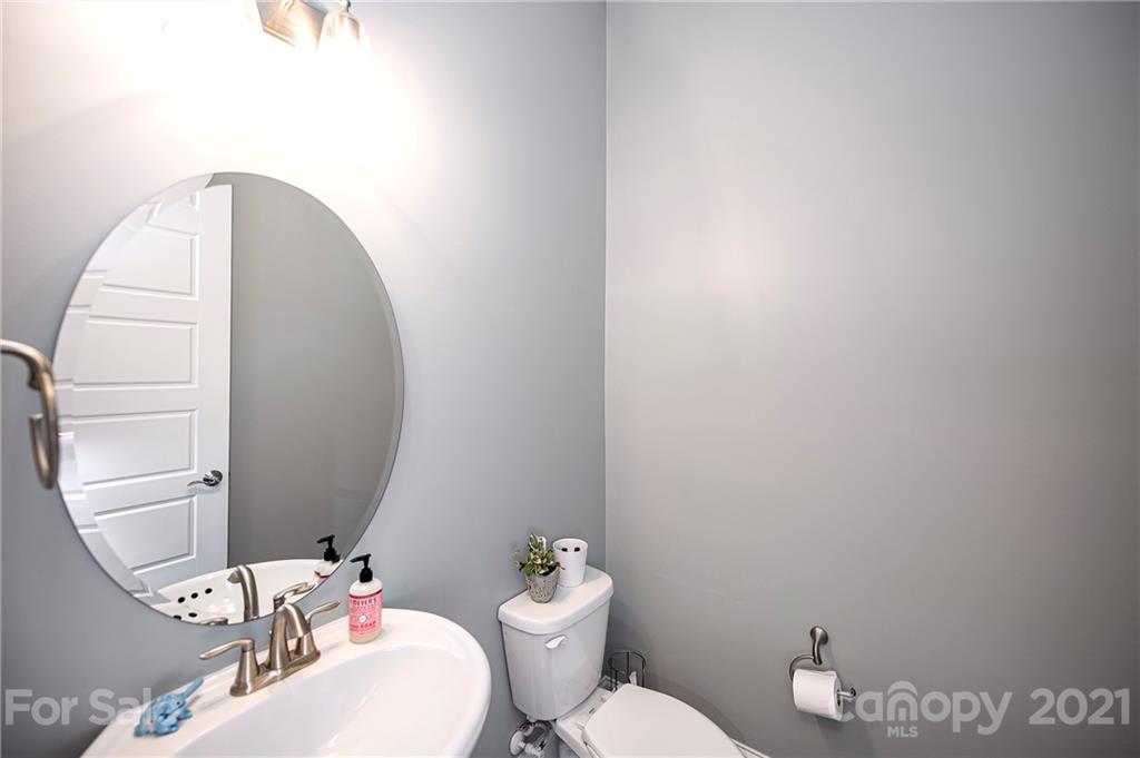 1286 Trinity Ridge Parkway Fort Mill, SC 29715 - Photo 15 of 48 a bathroom with a toilet a sink and mirror