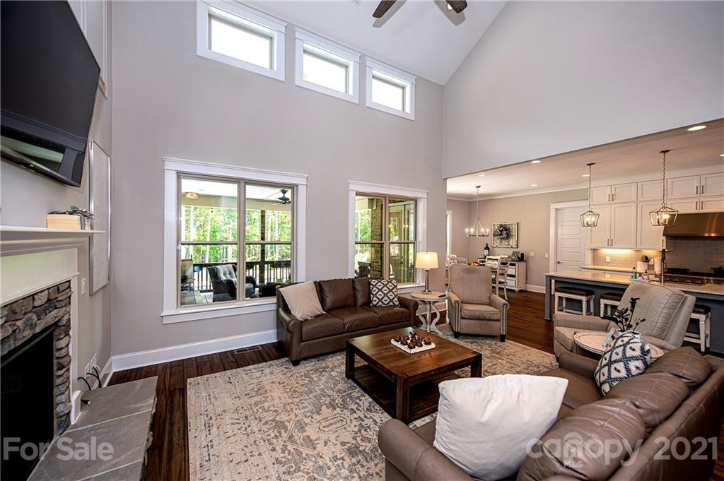 1286 Trinity Ridge Parkway Fort Mill, SC 29715 - Photo 16 of 48 a living room with furniture fireplace and a flat screen tv