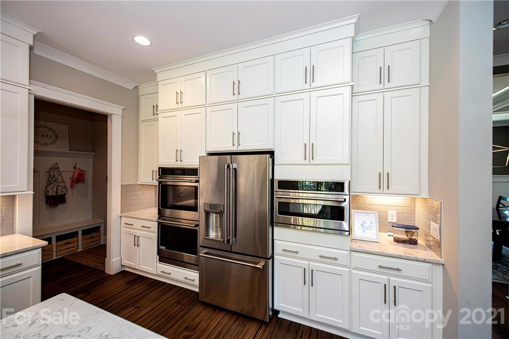 1286 Trinity Ridge Parkway Fort Mill, SC 29715 - Photo 20 of 48 a kitchen with cabinets stainless steel appliances and a window