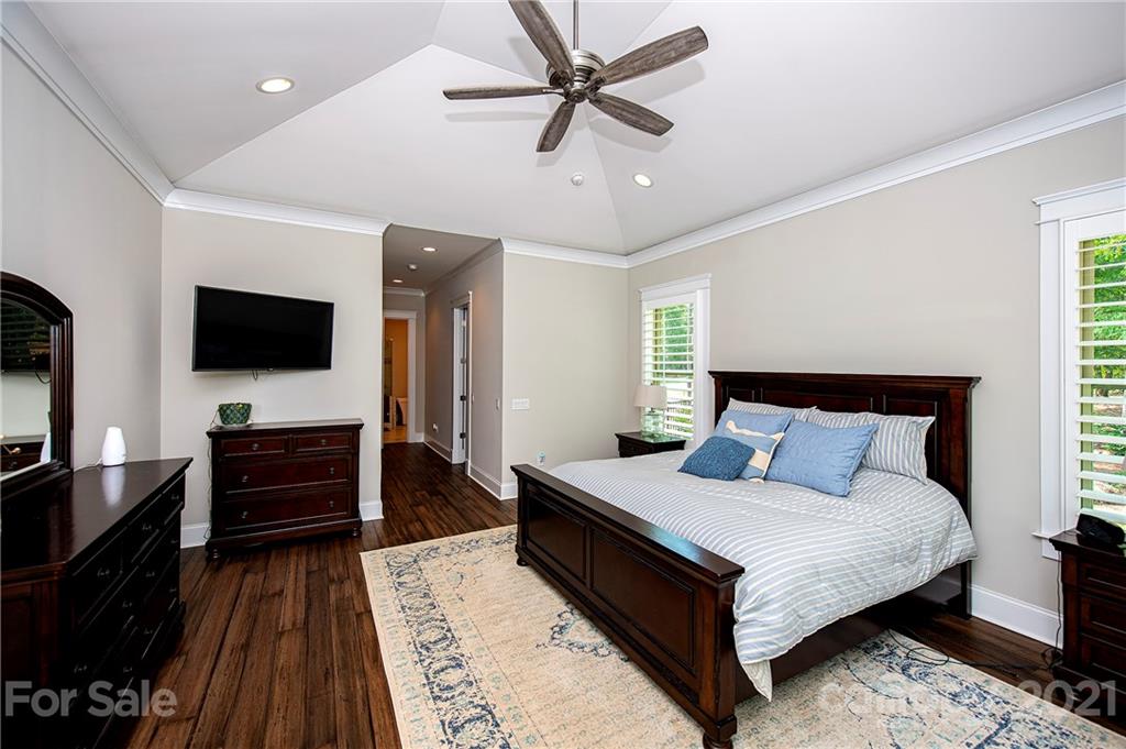 1286 Trinity Ridge Parkway Fort Mill, SC 29715 - Photo 27 of 48 a bed room with a bed and a television