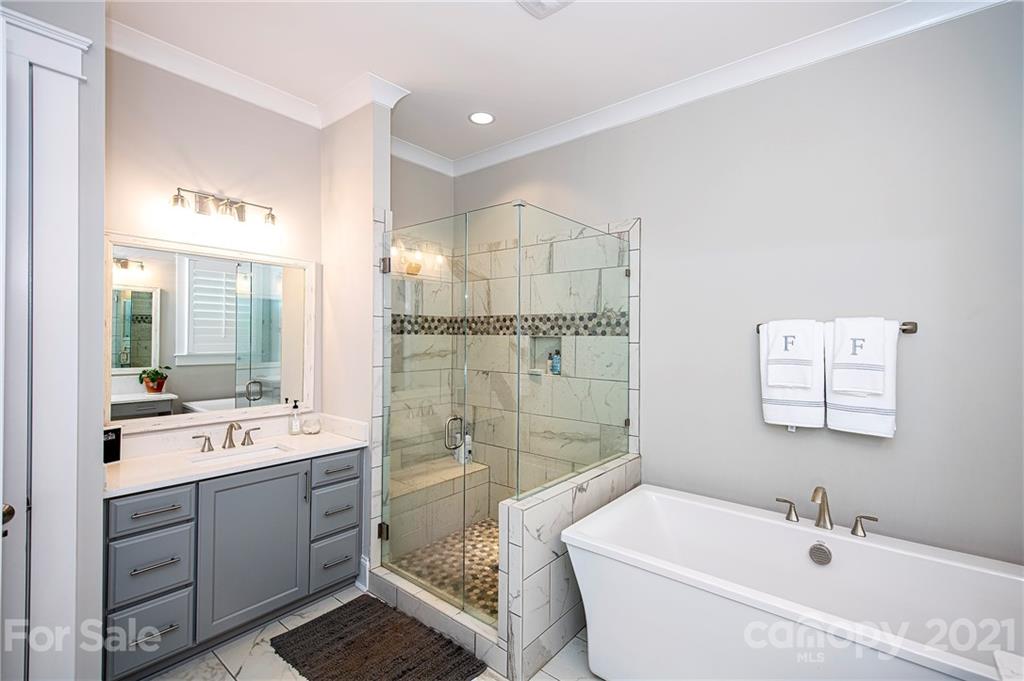 1286 Trinity Ridge Parkway Fort Mill, SC 29715 - Photo 29 of 48 a bathroom with a tub sink and mirror