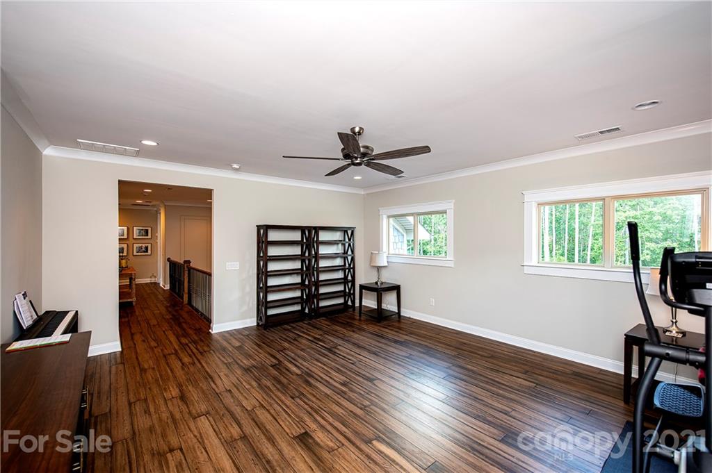 1286 Trinity Ridge Parkway Fort Mill, SC 29715 - Photo 37 of 48 wooden floor in an empty room with a window