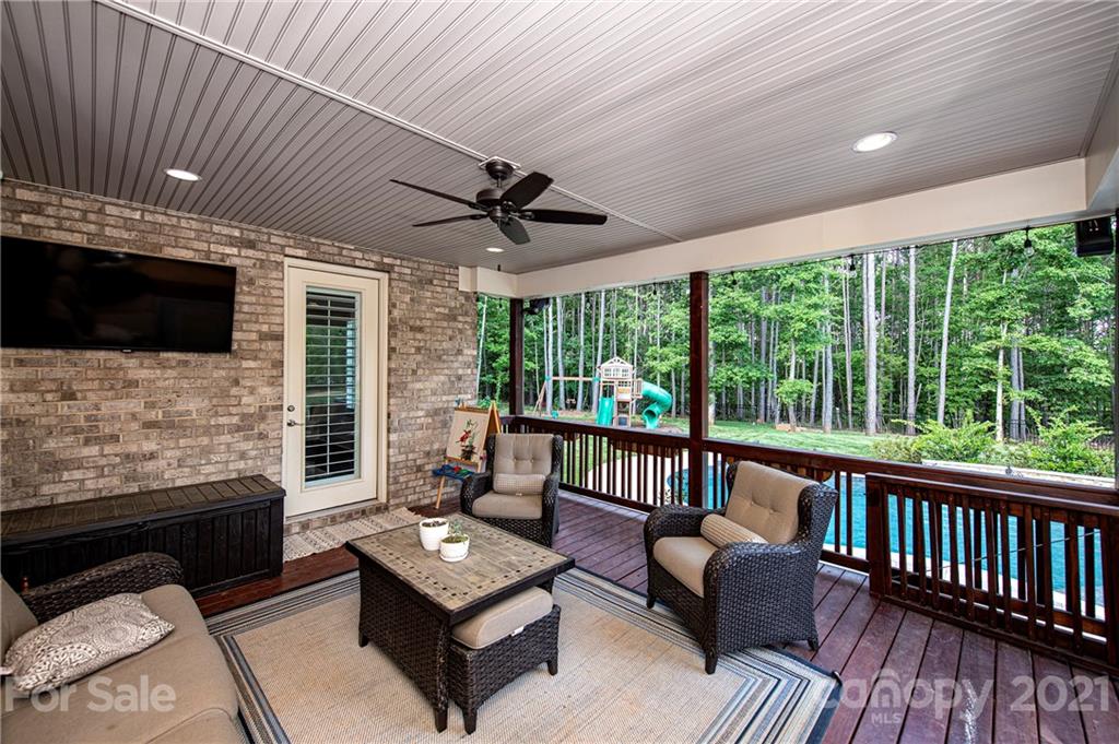 1286 Trinity Ridge Parkway Fort Mill, SC 29715 - Photo 39 of 48 a living room with furniture tv and a flat screen tv