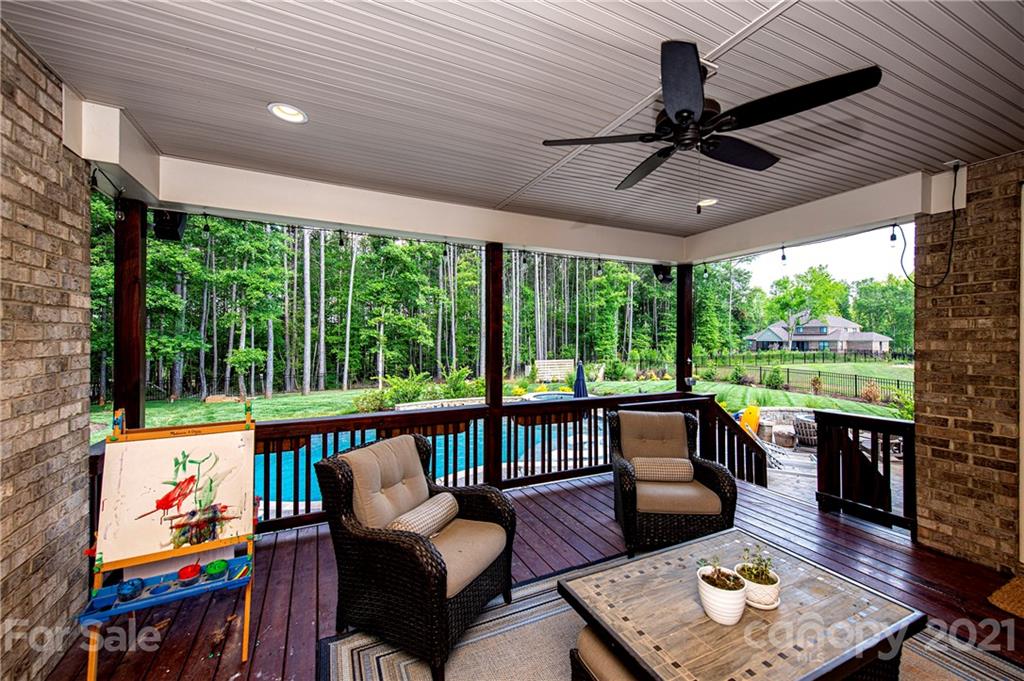 1286 Trinity Ridge Parkway Fort Mill, SC 29715 - Photo 40 of 48 a living room with furniture and a floor to ceiling window