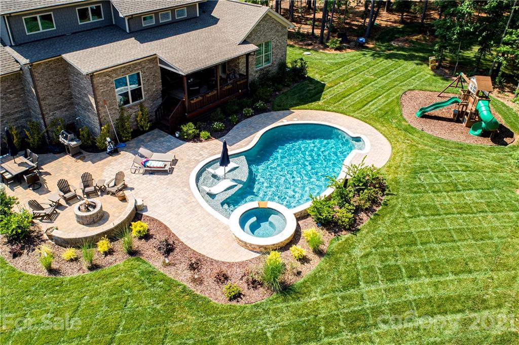 1286 Trinity Ridge Parkway Fort Mill, SC 29715 - Photo 5 of 48 a view of an outdoor sitting area with chairs