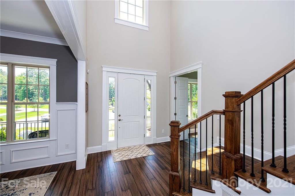1286 Trinity Ridge Parkway Fort Mill, SC 29715 - Photo 9 of 48 a view of entryway with wooden floor and stairs