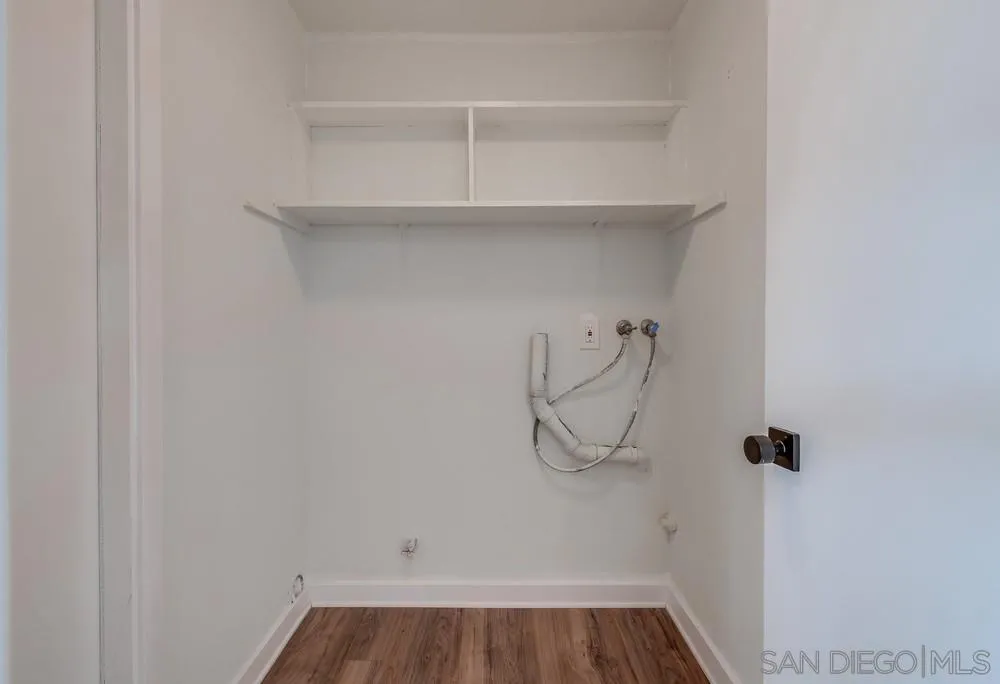 13362 Carriage Road Poway, CA 92064 - Photo 31 of 39 a view of a room with racks on the wall