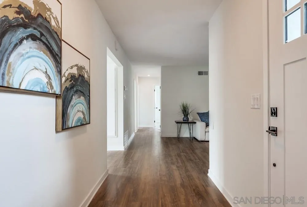 13362 Carriage Road Poway, CA 92064 - Photo 6 of 39 a view of a livingroom with a deck and a fireplace
