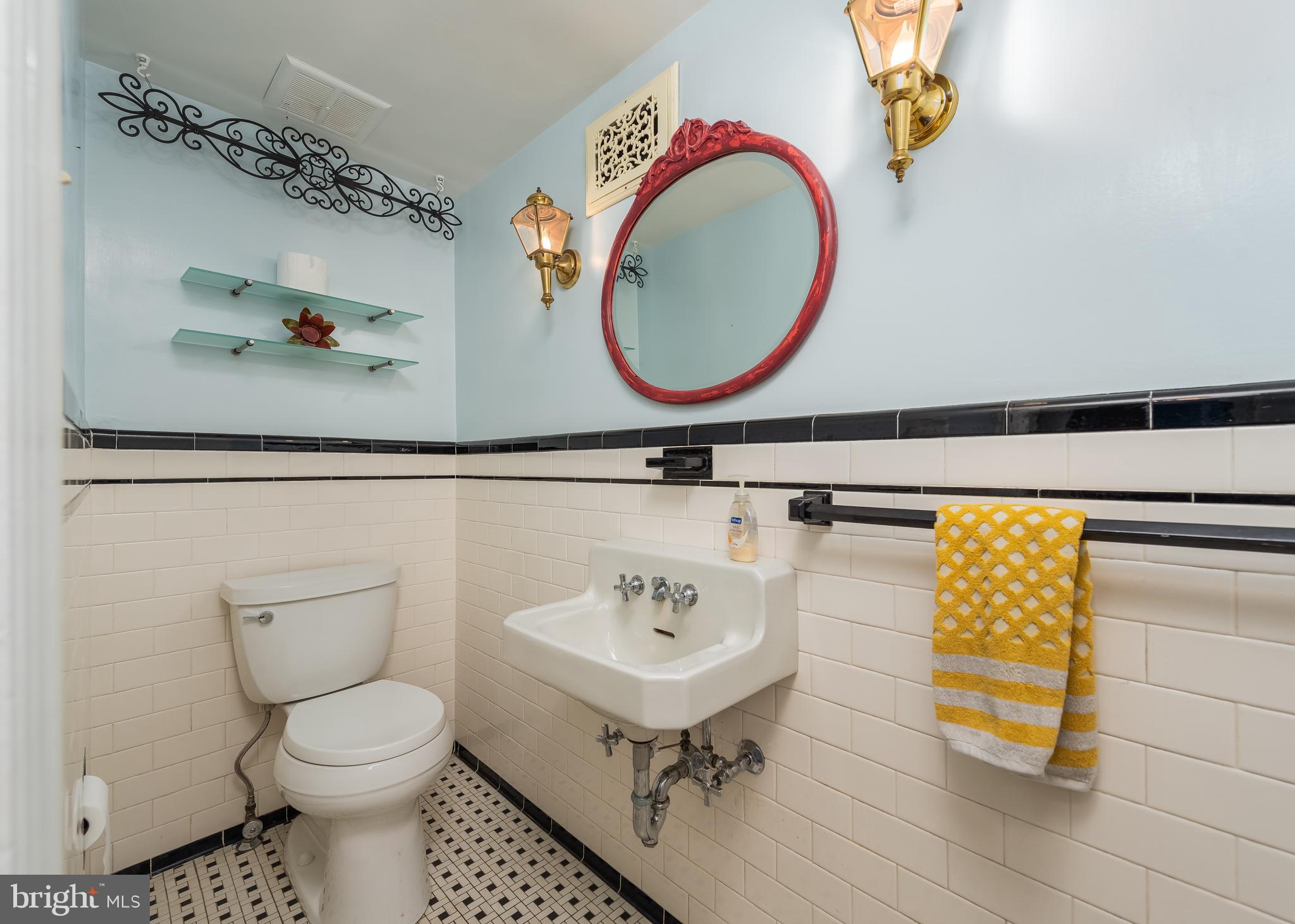 209 Patuxent Road Laurel, MD 20707 - Photo 17 of 26 Half bath on main level steps off foyer