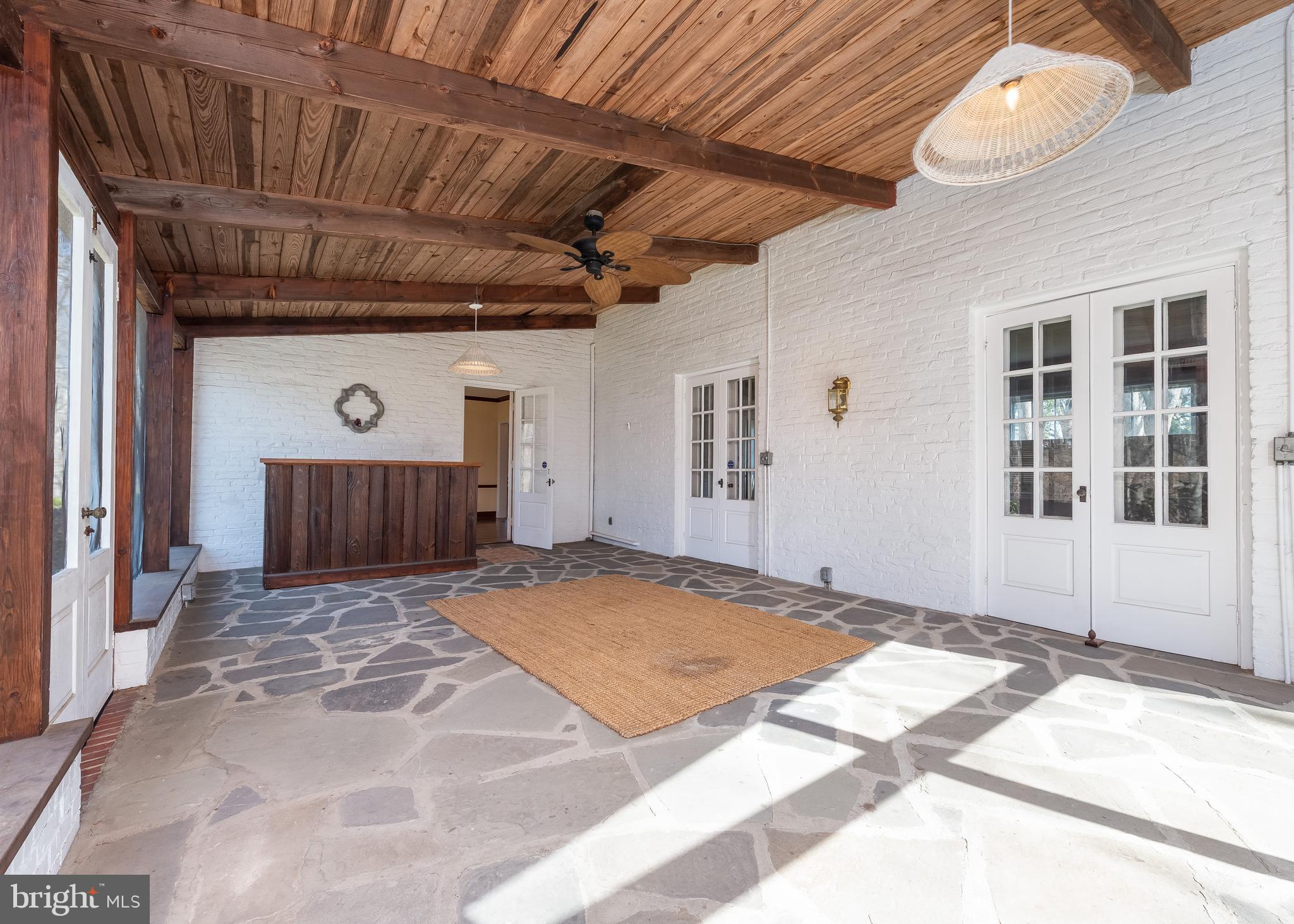 209 Patuxent Road Laurel, MD 20707 - Photo 25 of 26 Screened porch off living room and dining room
