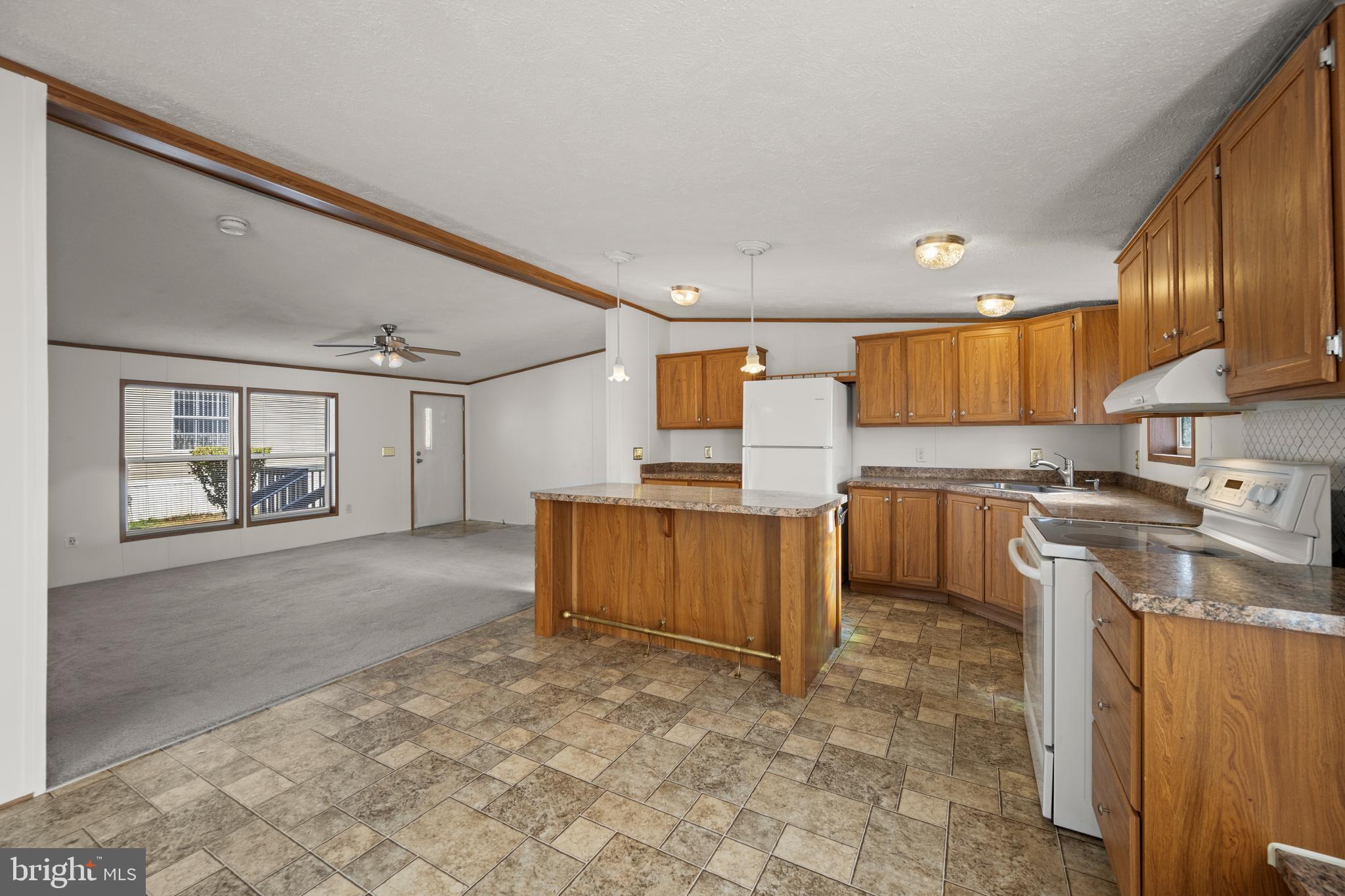 8408 Heartwood Road Jessup, MD 20794 - Photo 11 of 32 a large kitchen with cabinets