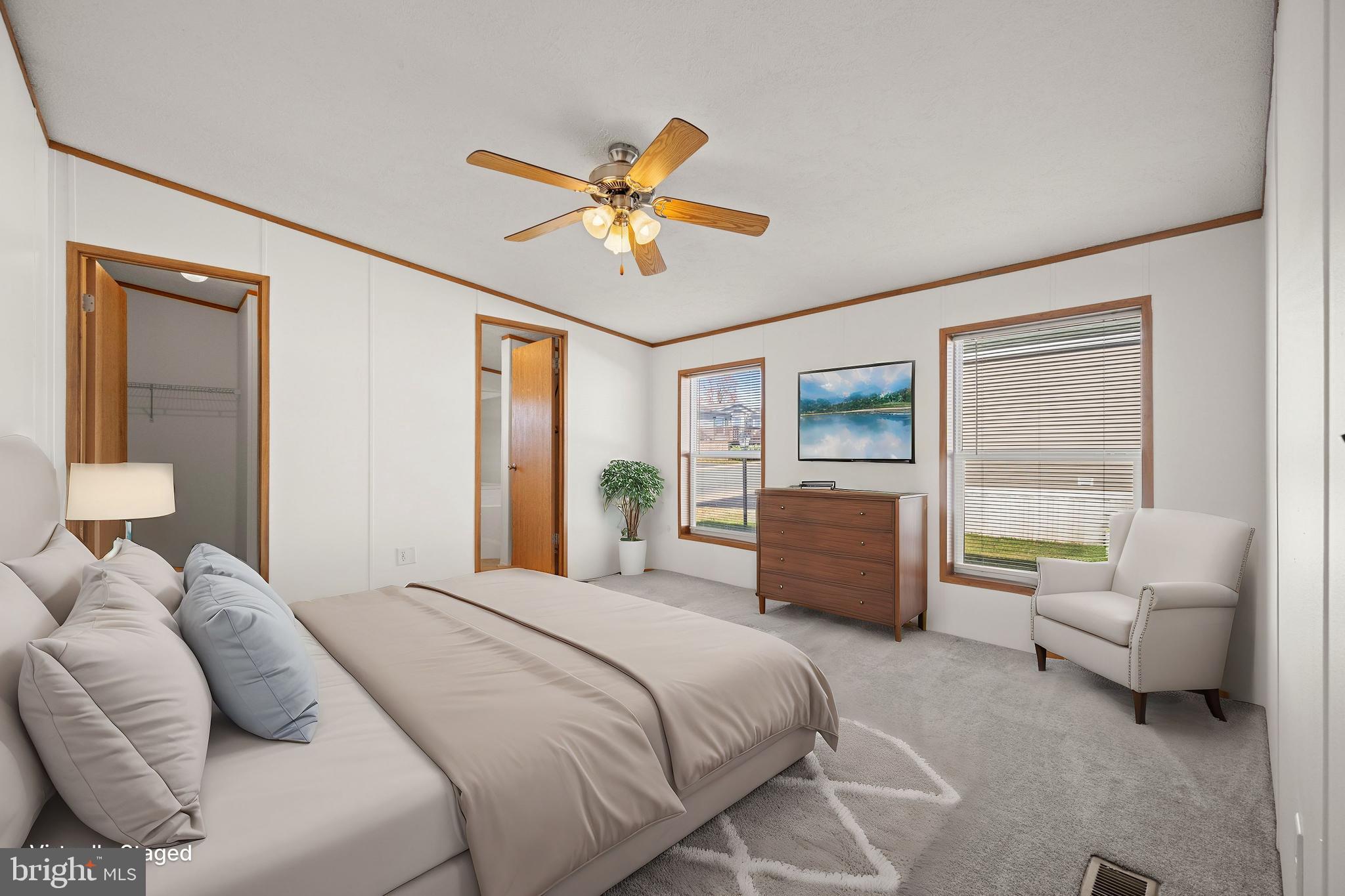 8408 Heartwood Road Jessup, MD 20794 - Photo 17 of 32 a bedroom with a bed and a couch