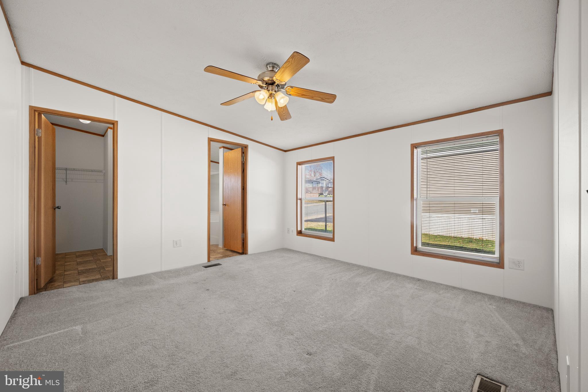 8408 Heartwood Road Jessup, MD 20794 - Photo 18 of 32 a view of an empty room with a window