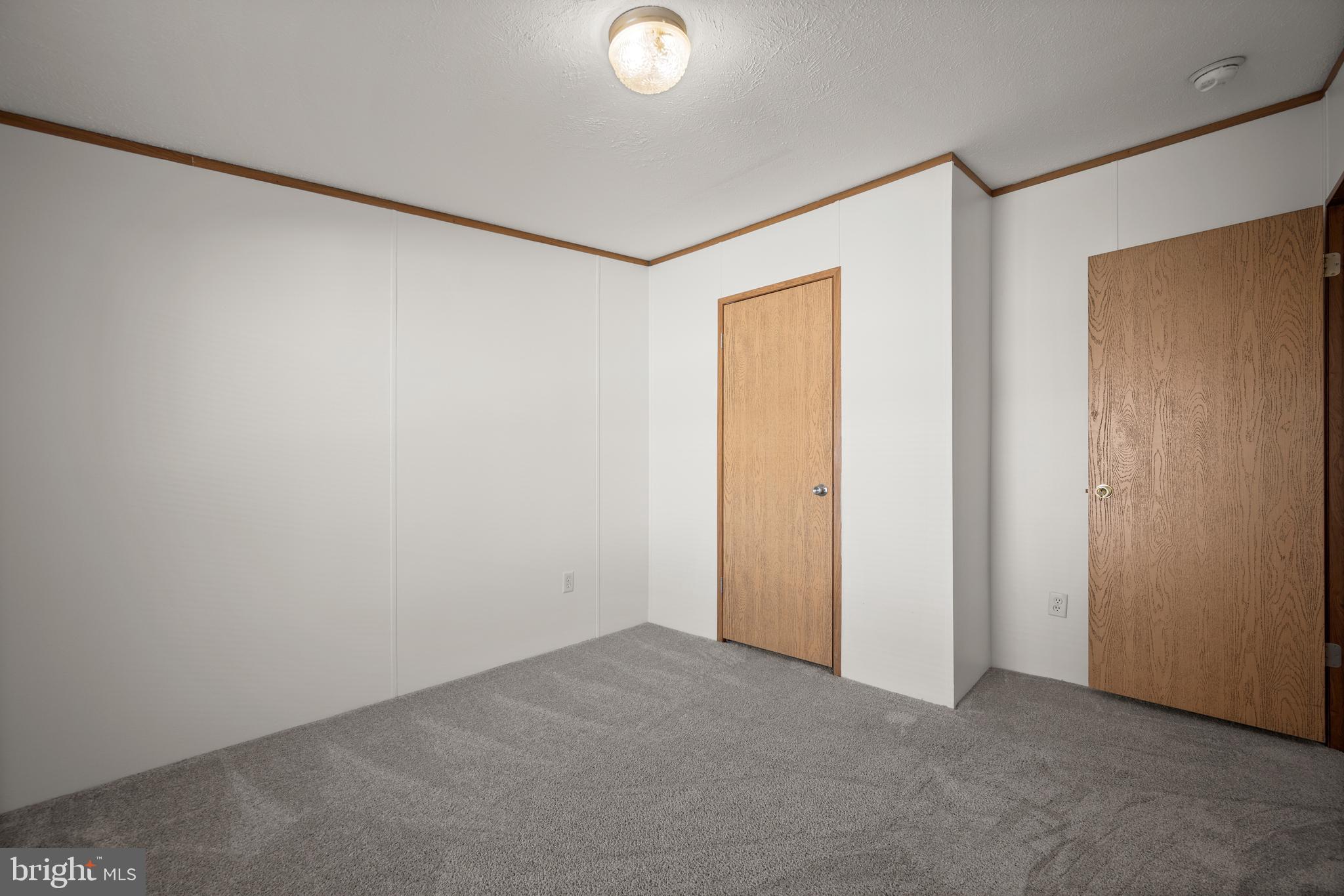 8408 Heartwood Road Jessup, MD 20794 - Photo 23 of 32 a view of an empty room