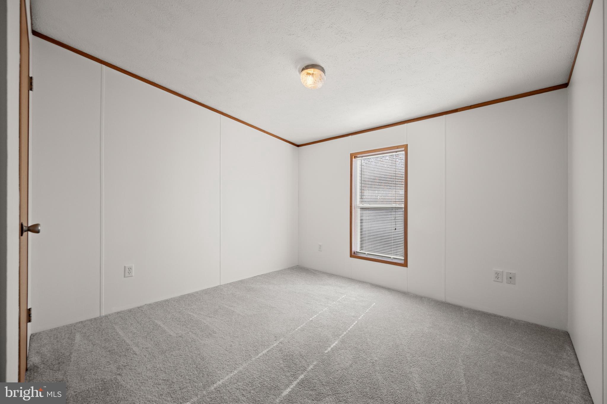 8408 Heartwood Road Jessup, MD 20794 - Photo 25 of 32 a view of an empty room with a window