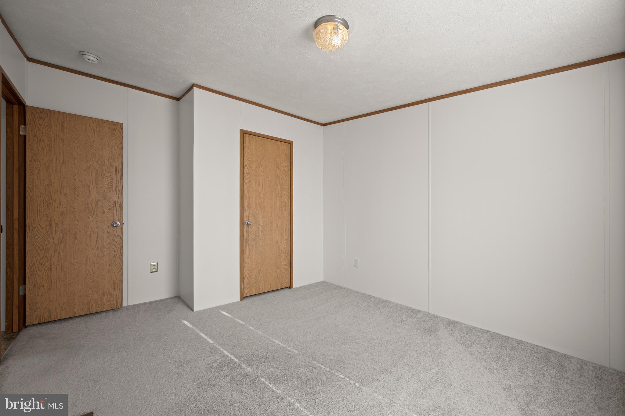 8408 Heartwood Road Jessup, MD 20794 - Photo 26 of 32 a view of an empty room