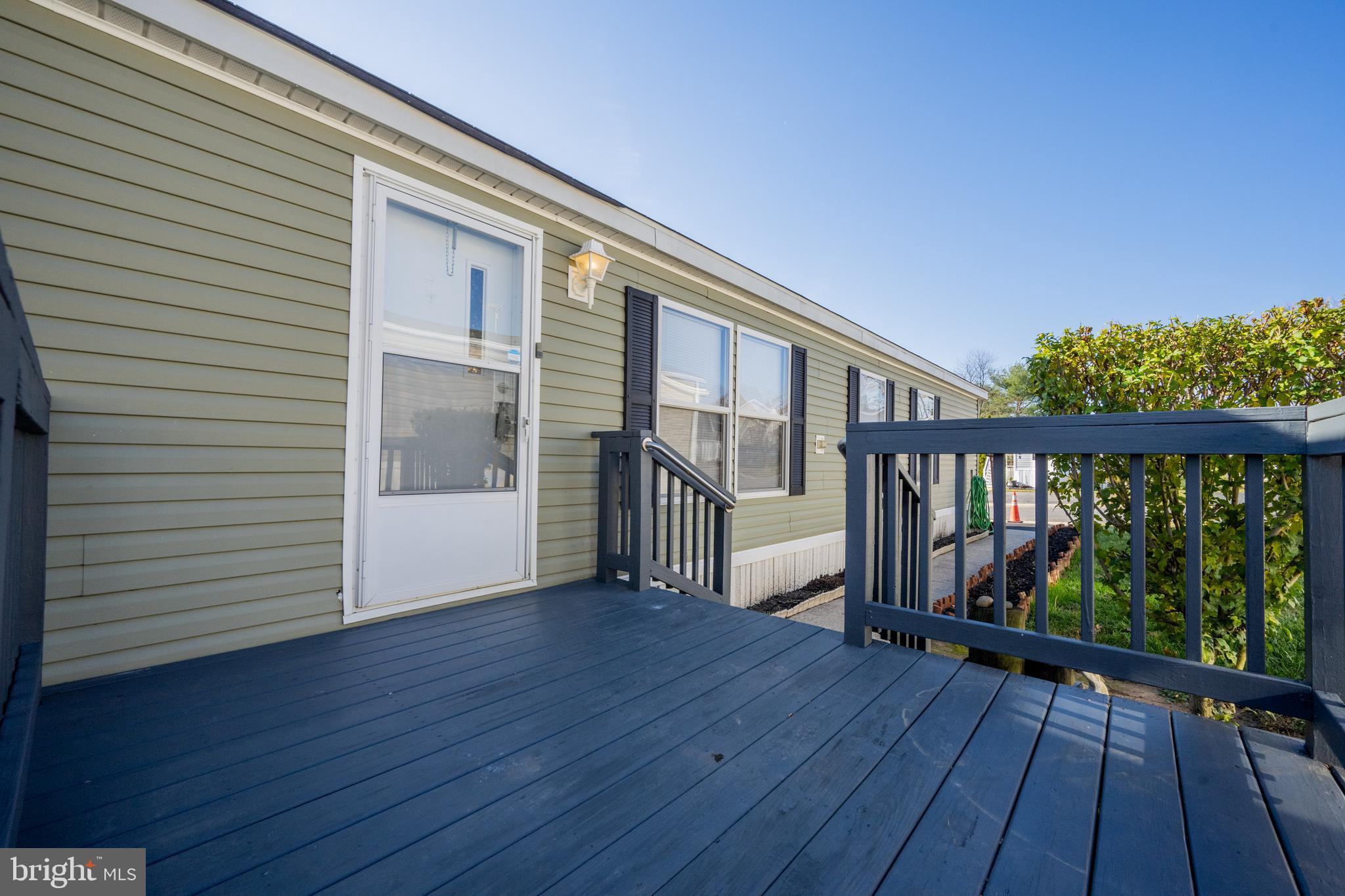 8408 Heartwood Road Jessup, MD 20794 - Photo 28 of 32 a view of a balcony with wooden floor