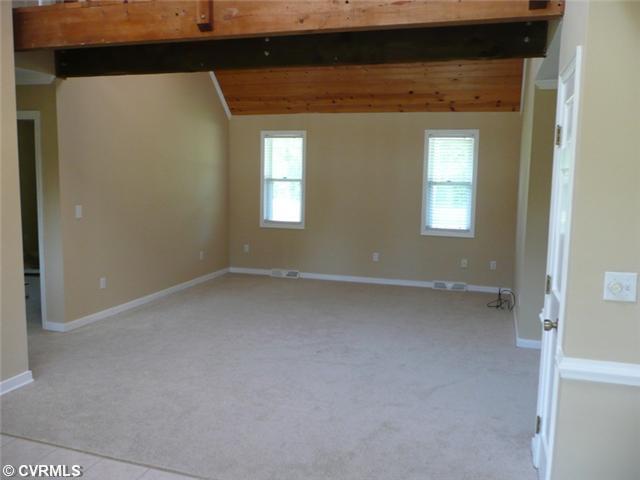 541 Enon Church Road Chester, VA 23836 - Photo 4 of 12 Den/Family/Great Room - Family Room just off the Dining Area has New Neutral Plush Carpet and Tasteful Neutral Paint Colors. Vaulted Ceiling keeps the room open as well as the catwalk on the Second floor.