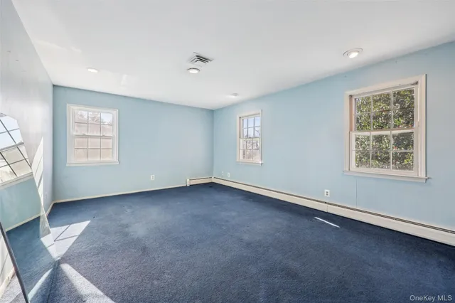 an empty room with windows