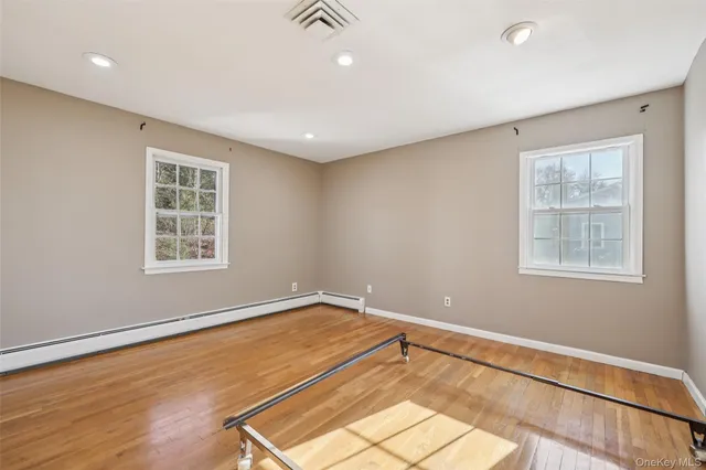 a view of a room with windows