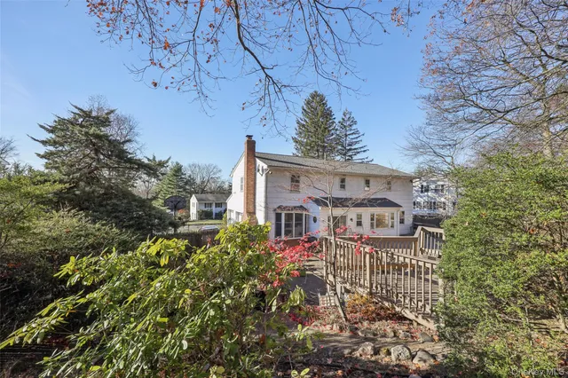 front view of a house with a small yard