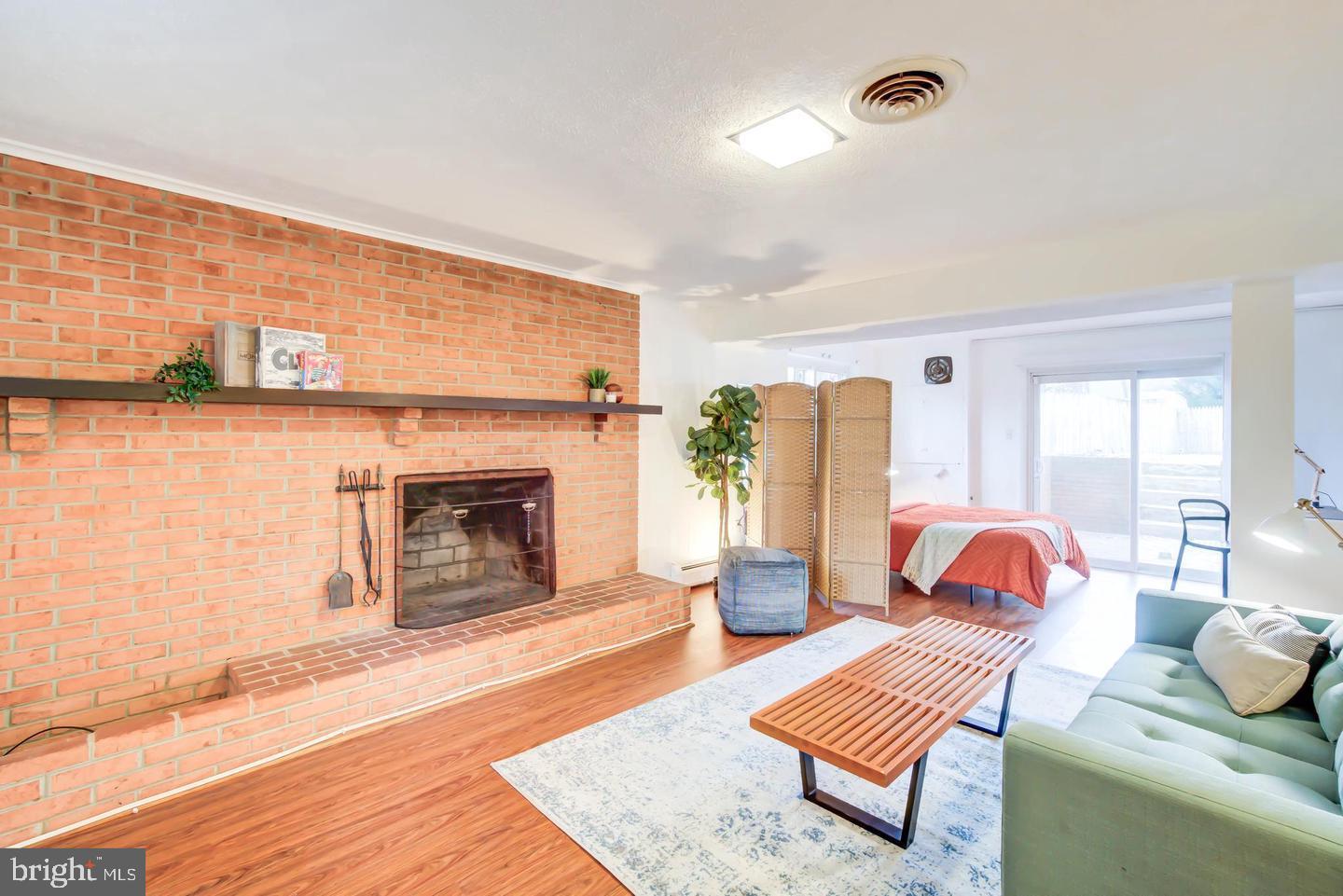 11207 Emack Road Beltsville, MD 20705 - Photo 26 of 43 Cozy living space with rustic charm.
