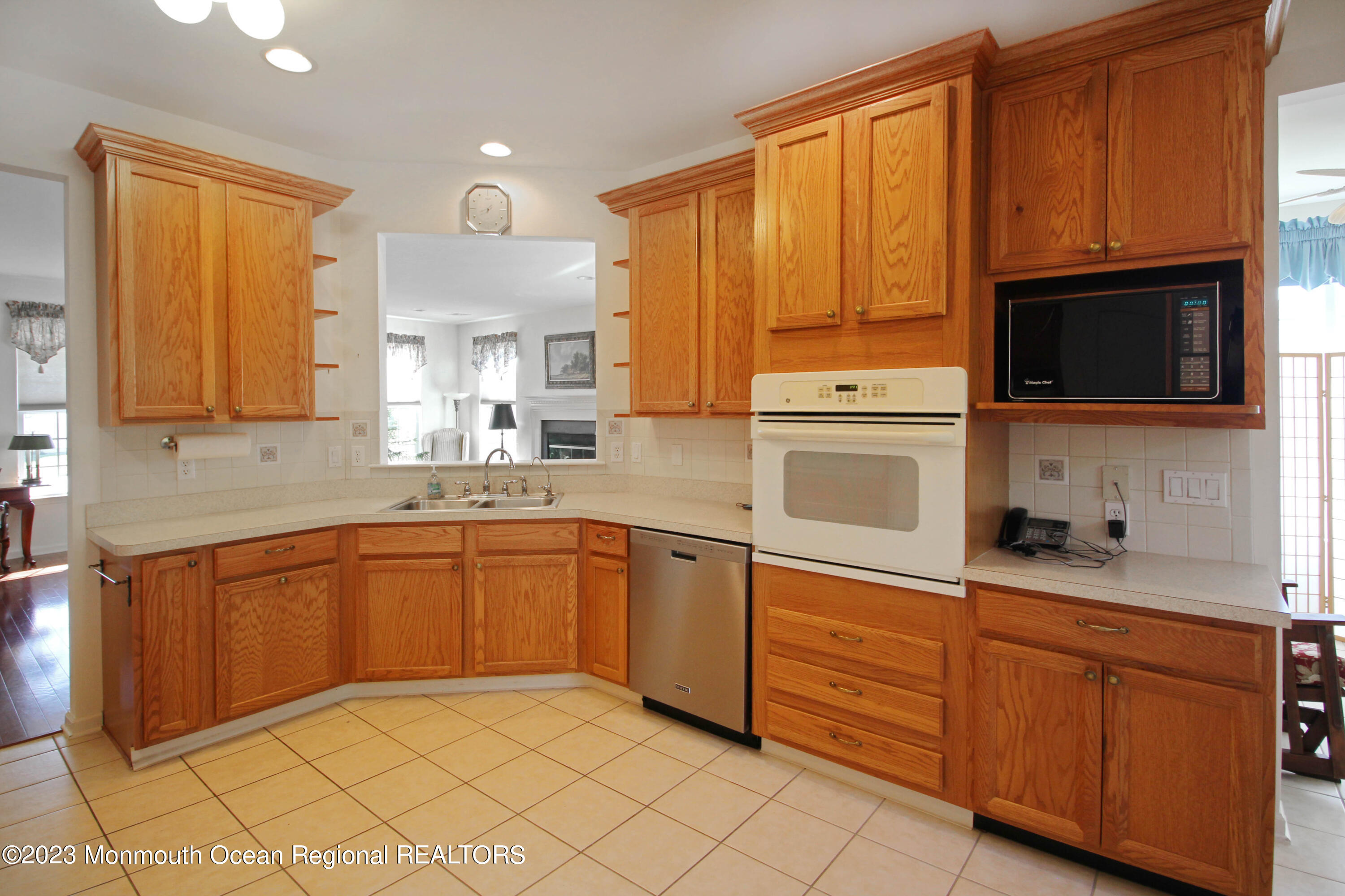 11 Carriage Road Whiting, NJ 08759 - Photo 11 of 35 a kitchen with granite countertop cabinets stainless steel appliances a sink and a window
