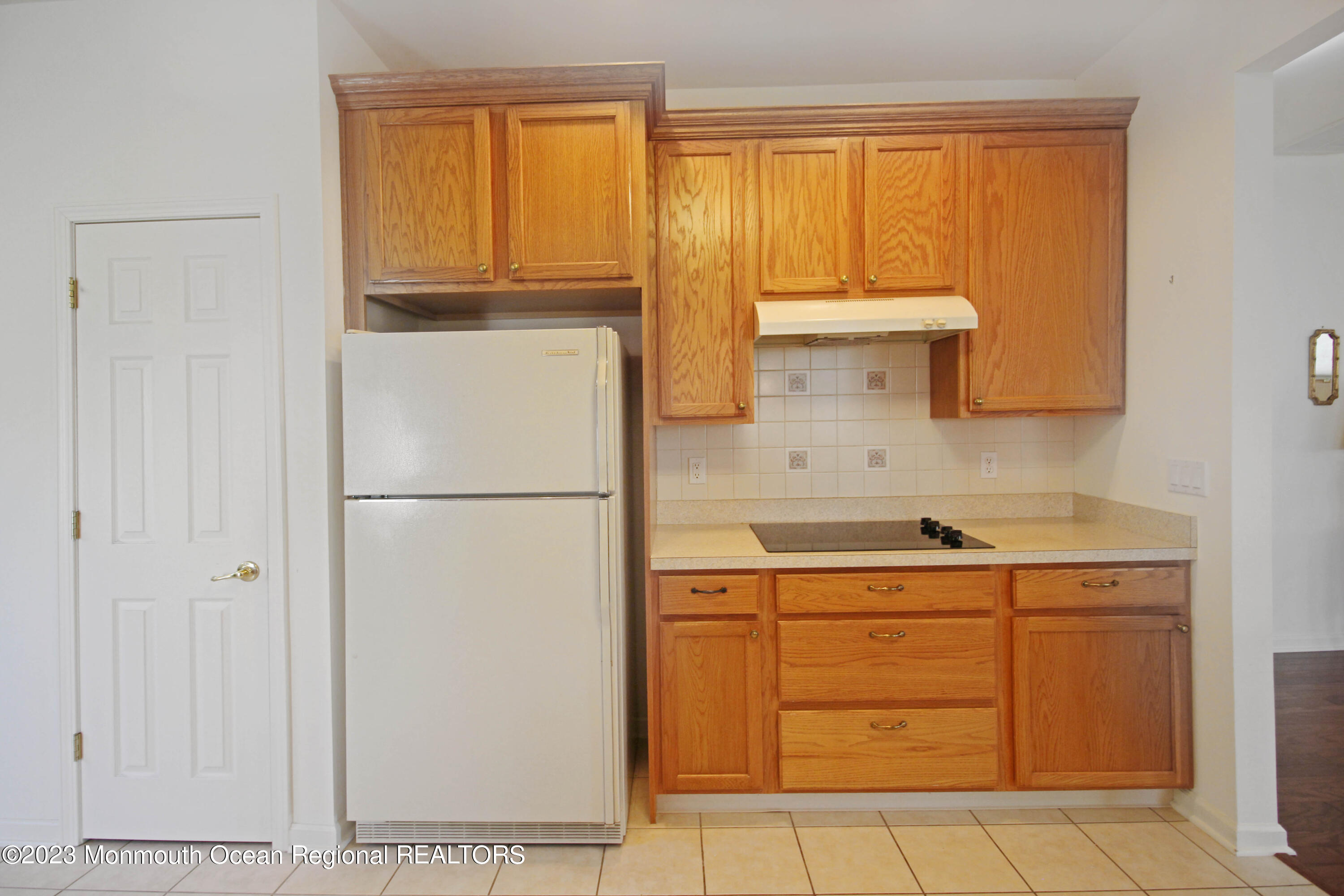 11 Carriage Road Whiting, NJ 08759 - Photo 13 of 35 a kitchen with a refrigerator and a sink