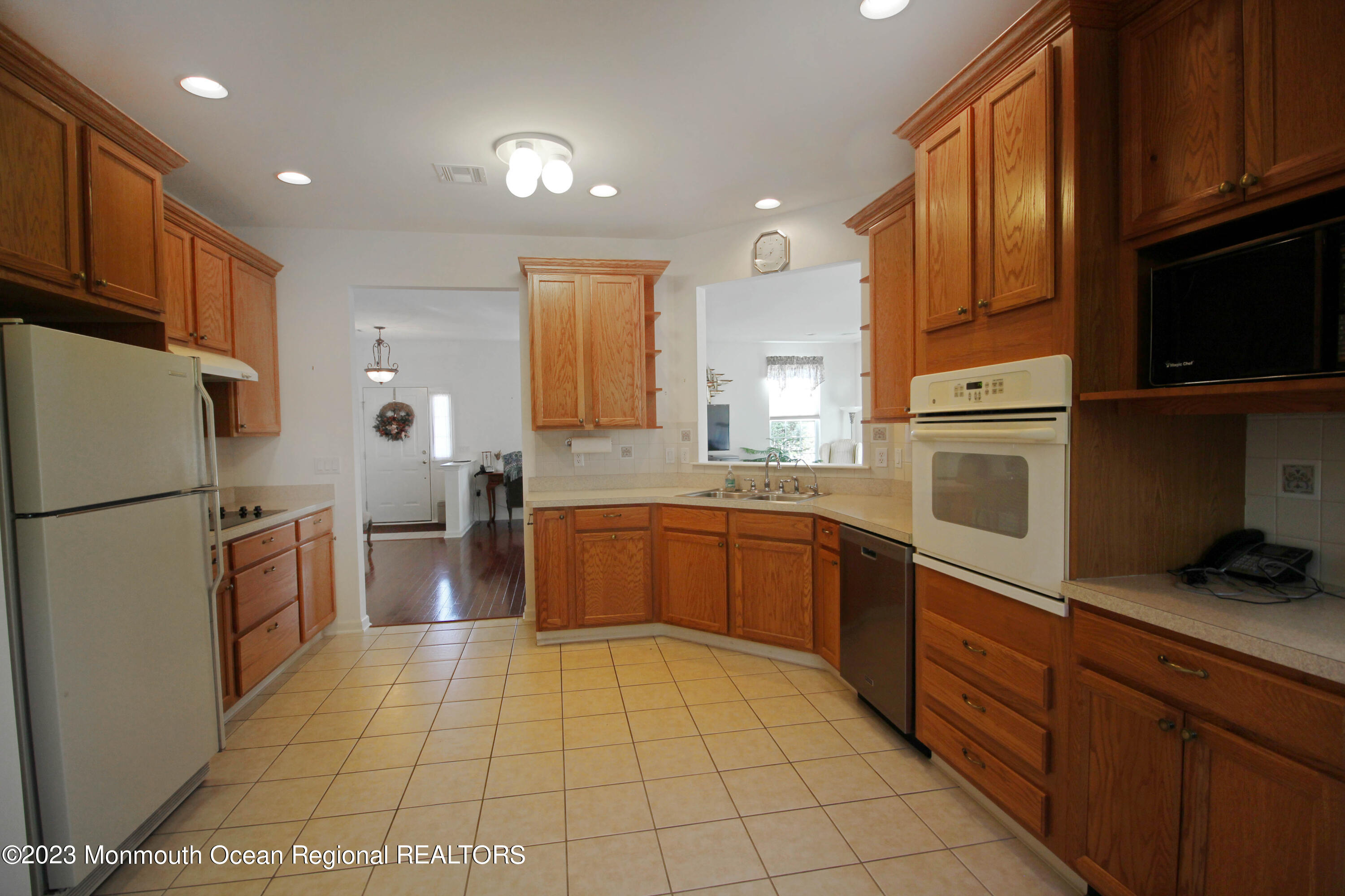 11 Carriage Road Whiting, NJ 08759 - Photo 15 of 35 a kitchen with a refrigerator sink and stove top oven