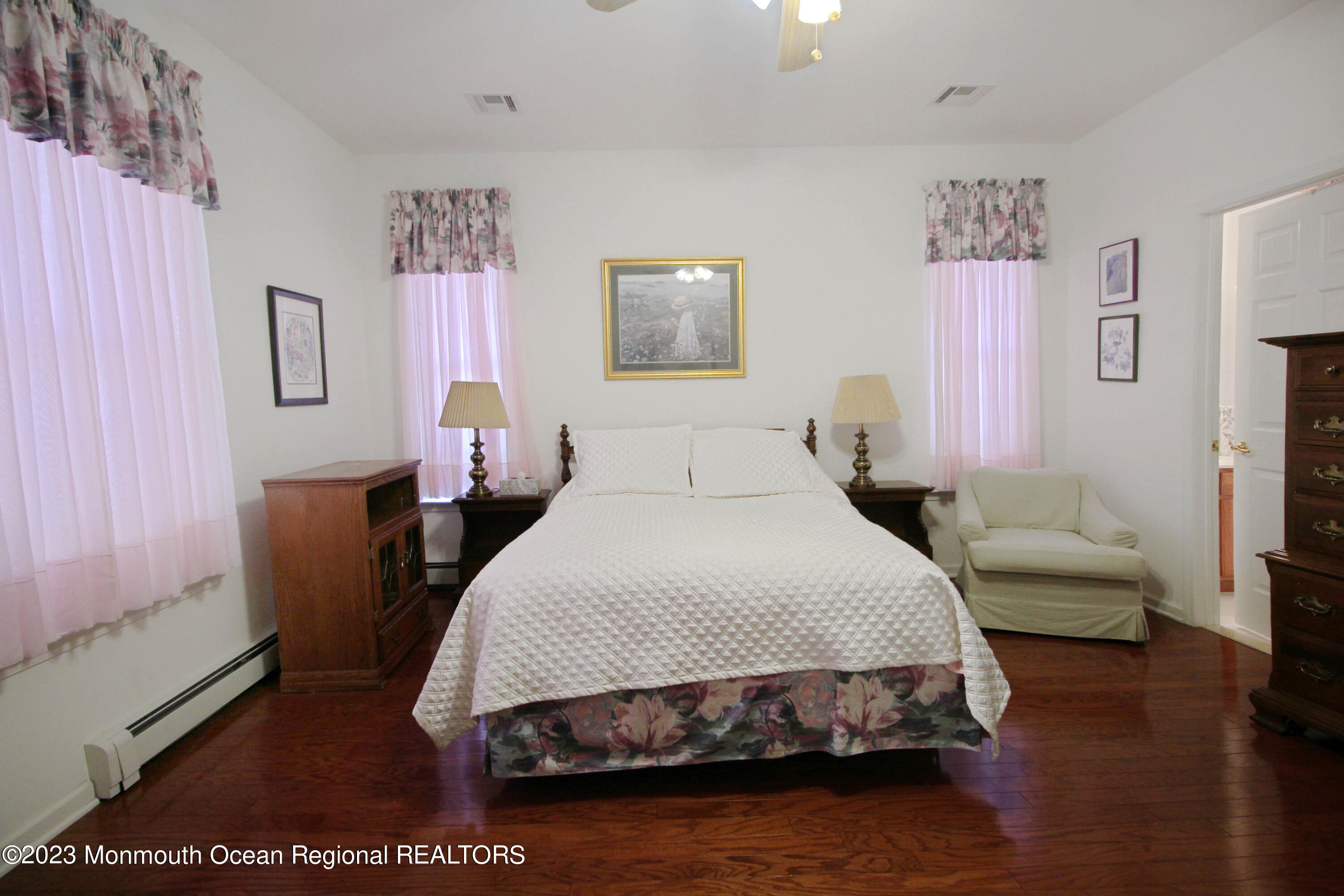 11 Carriage Road Whiting, NJ 08759 - Photo 19 of 35 a bedroom with a bed a couch and dresser