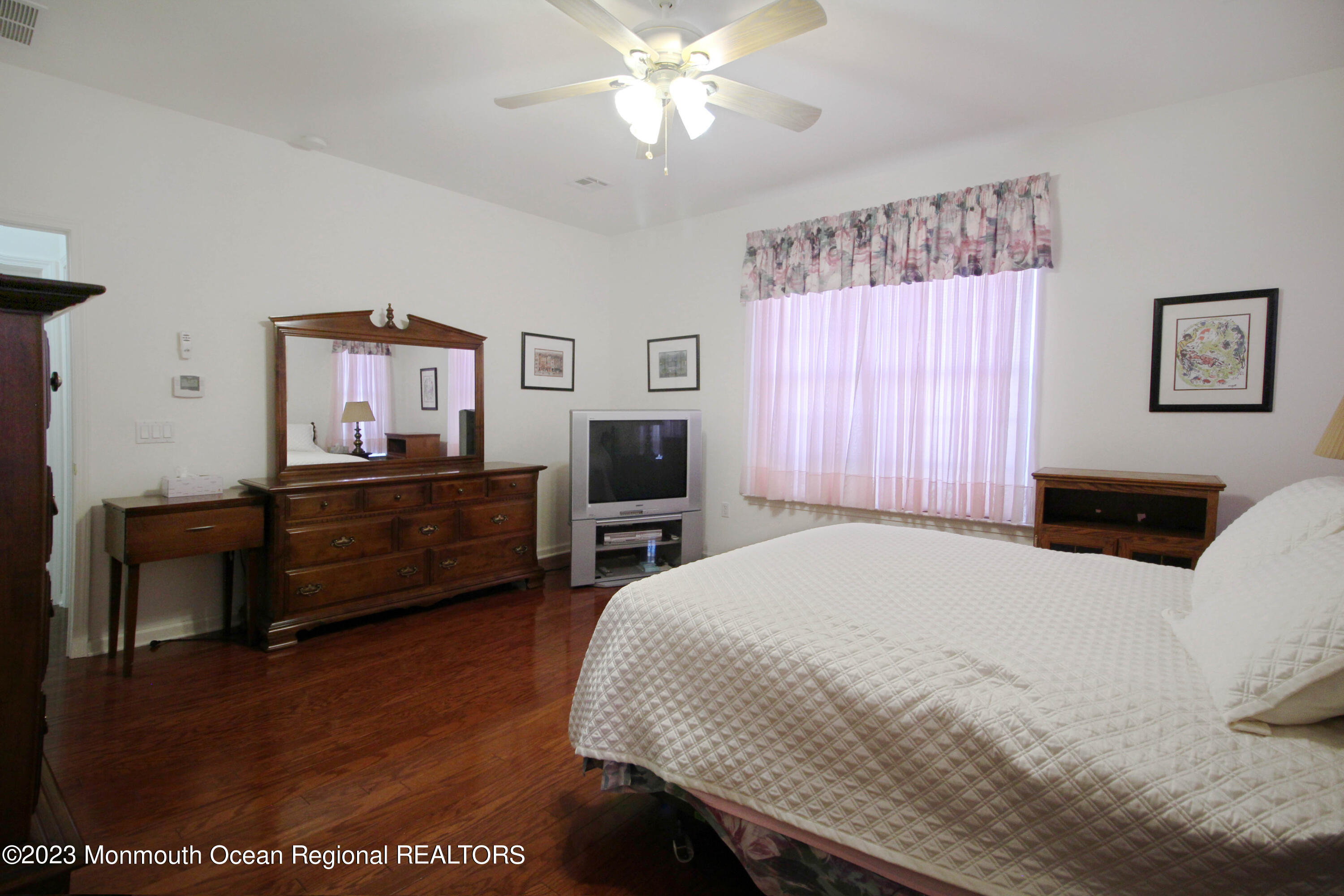 11 Carriage Road Whiting, NJ 08759 - Photo 21 of 35 a bedroom with a bed and a dresser