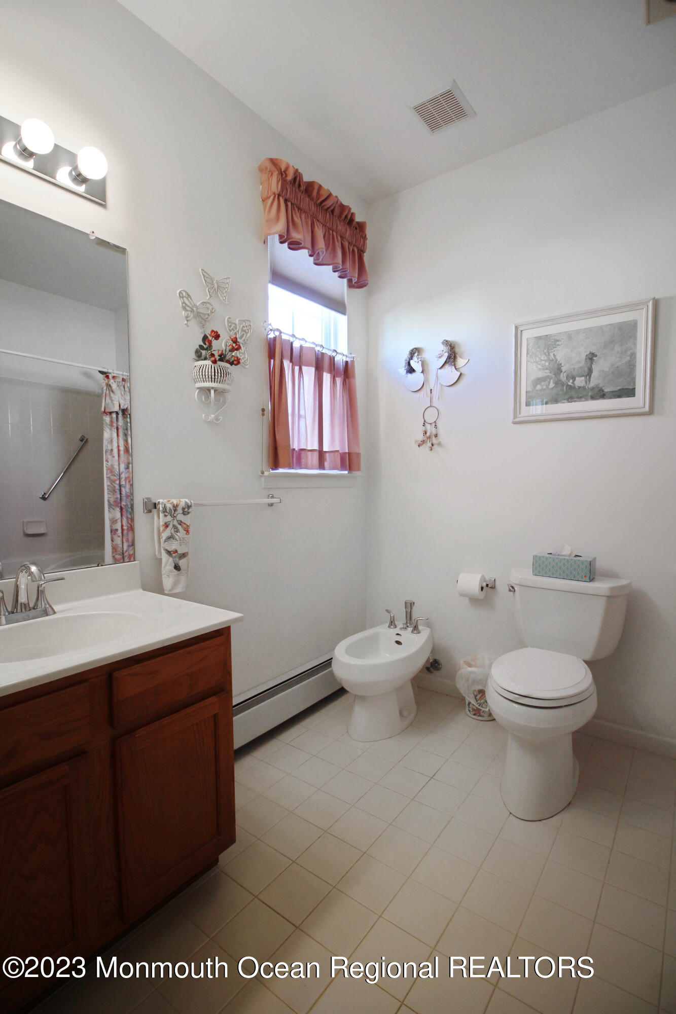 11 Carriage Road Whiting, NJ 08759 - Photo 23 of 35 a bathroom with a toilet a sink and mirror