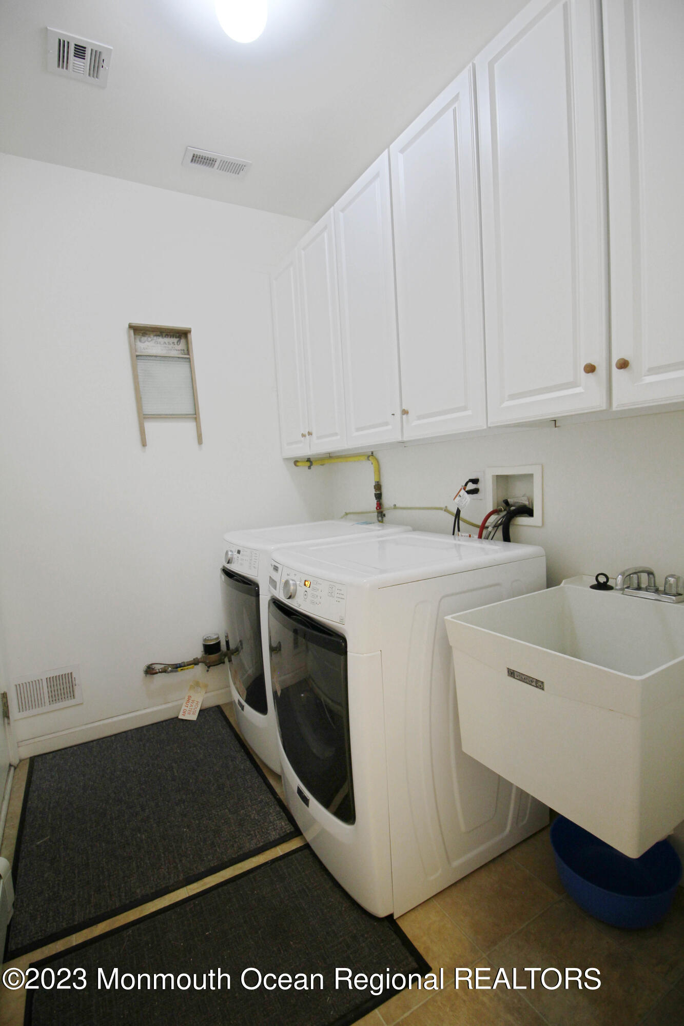 11 Carriage Road Whiting, NJ 08759 - Photo 28 of 35 a utility room with sink dryer and washer