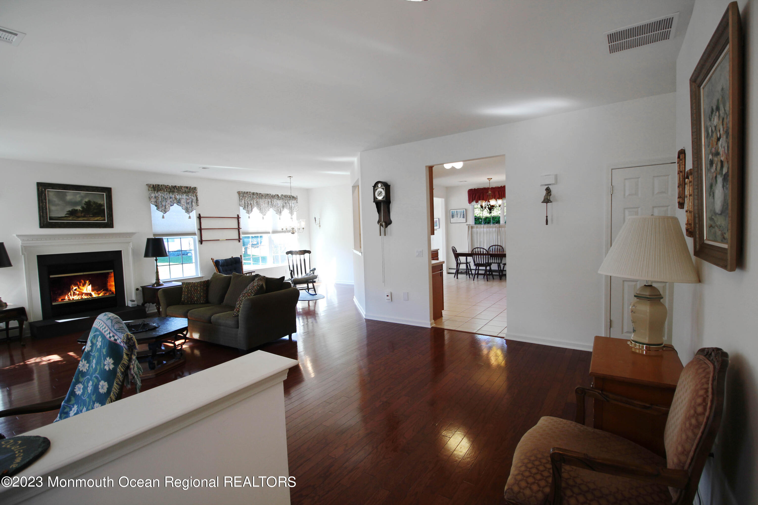 11 Carriage Road Whiting, NJ 08759 - Photo 4 of 35 a living room with furniture and a fireplace