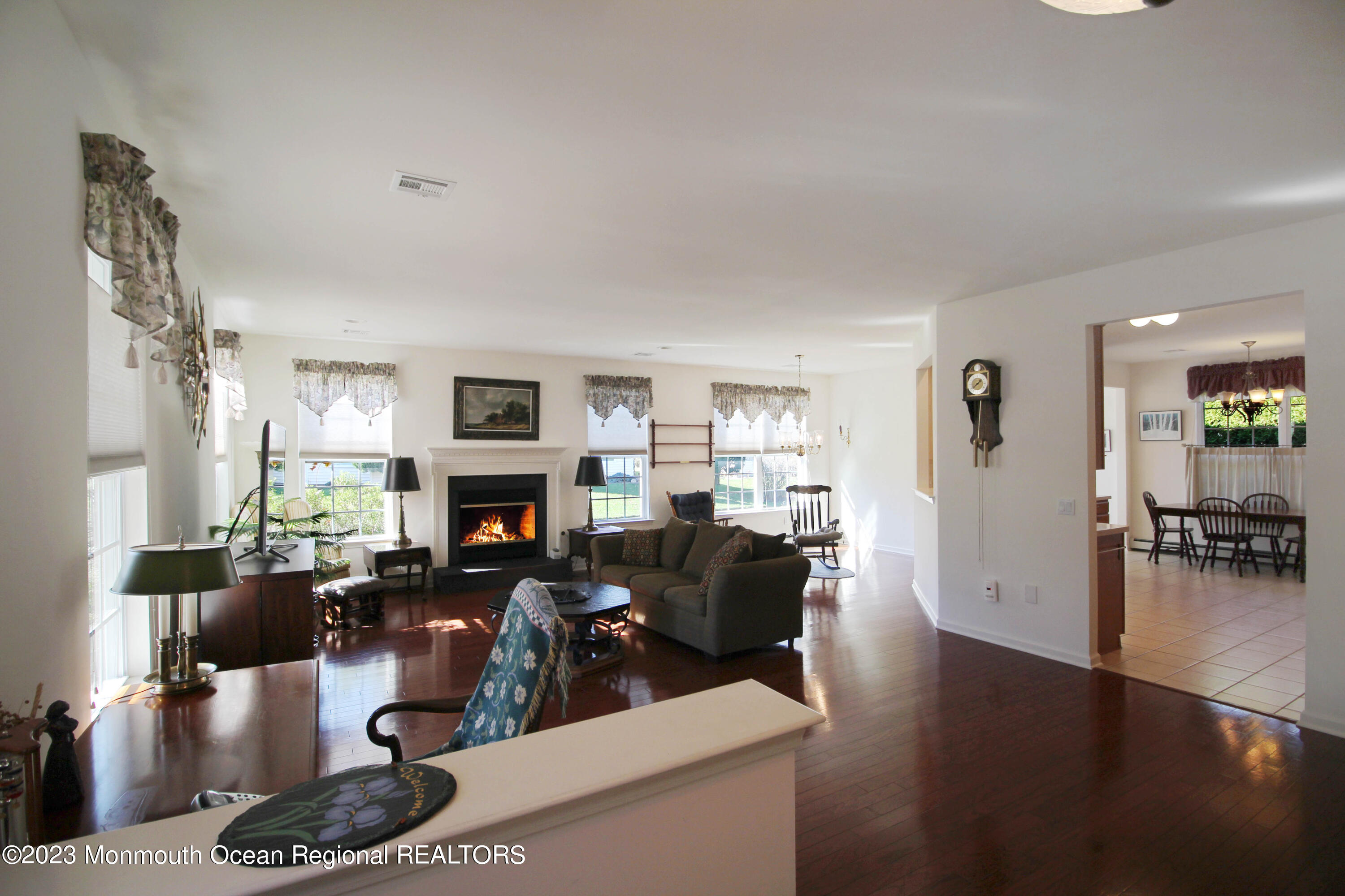 11 Carriage Road Whiting, NJ 08759 - Photo 5 of 35 a living room with furniture and a fireplace