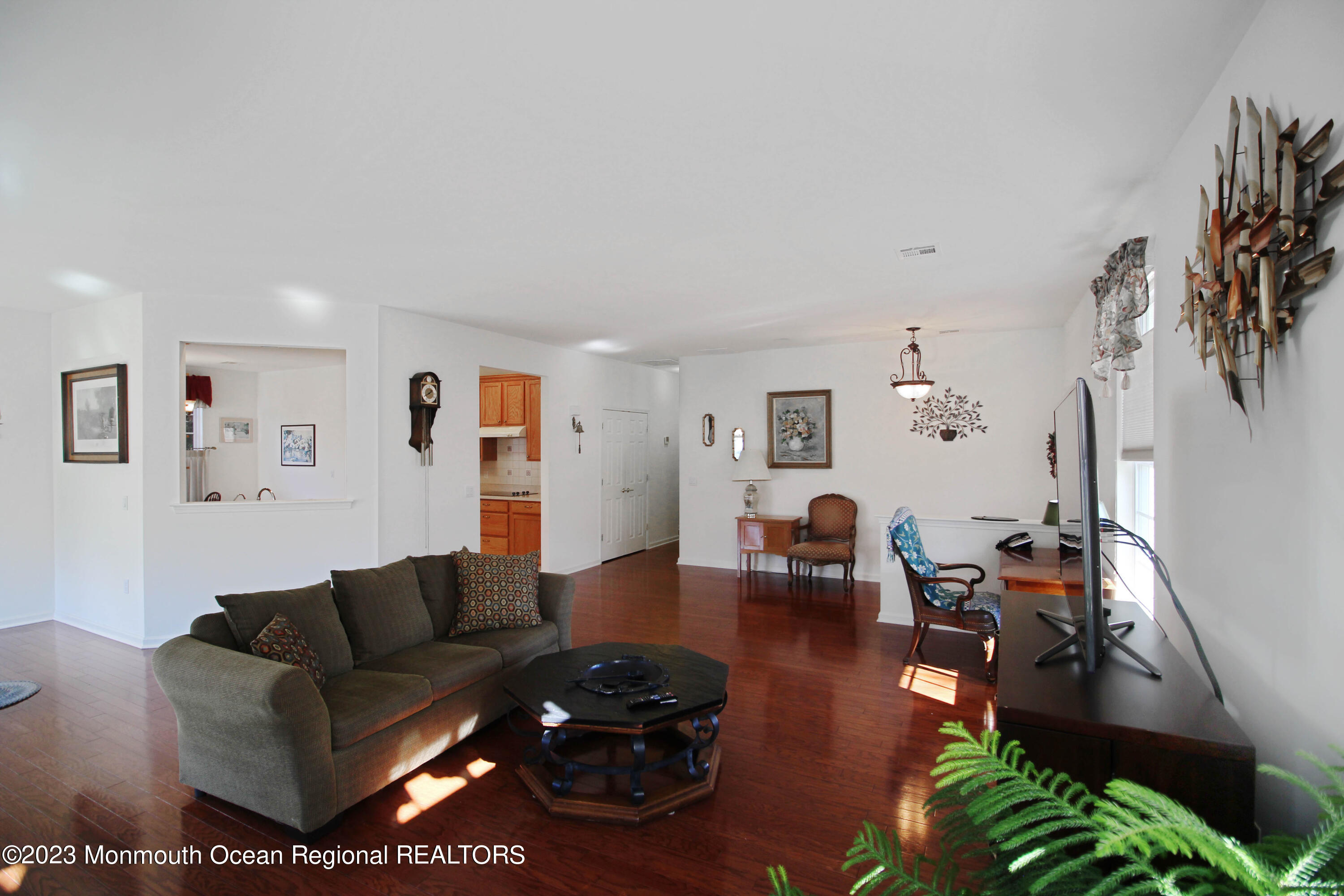 11 Carriage Road Whiting, NJ 08759 - Photo 8 of 35 a living room with furniture and a wooden floor