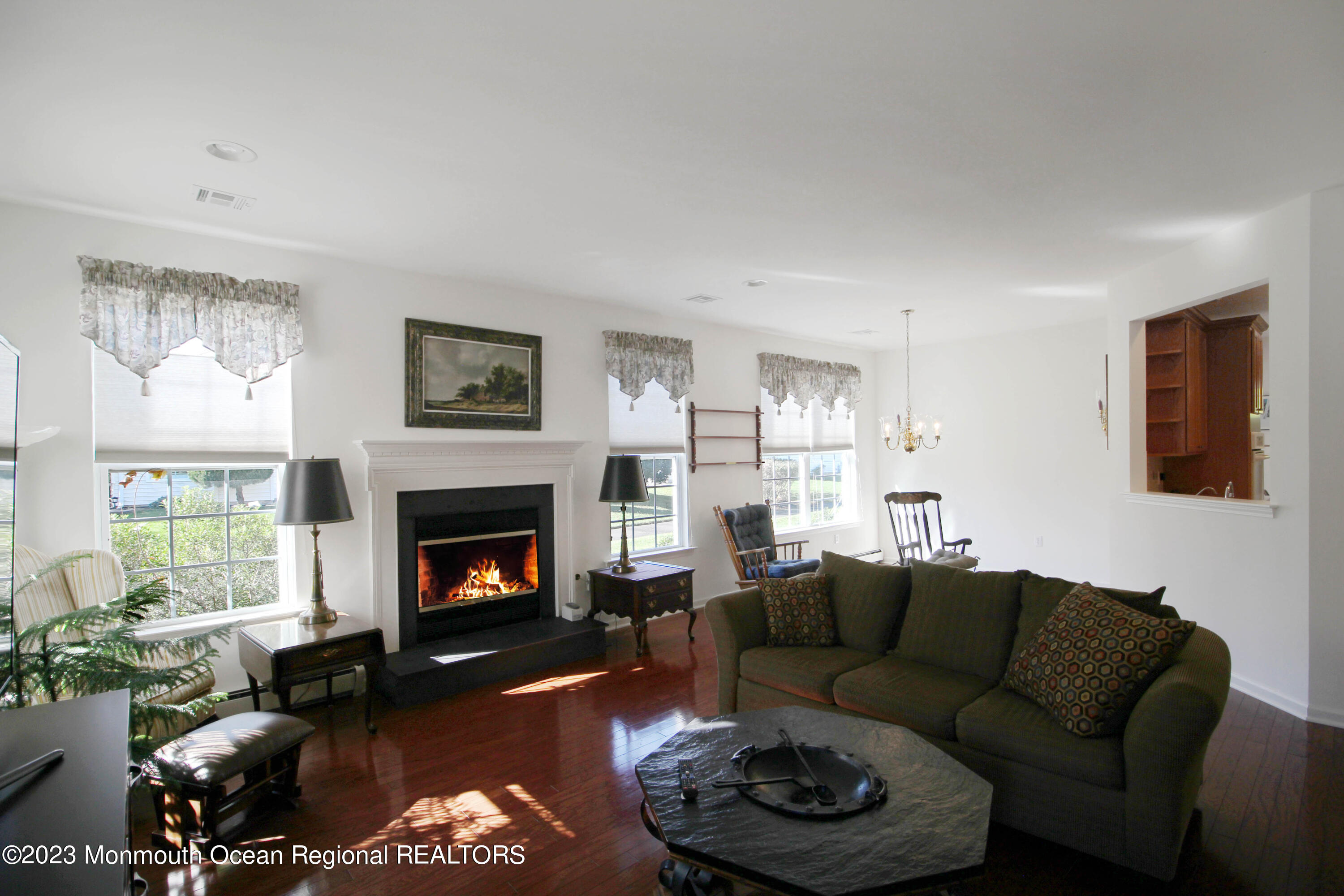 11 Carriage Road Whiting, NJ 08759 - Photo 9 of 35 a living room with furniture and a fireplace
